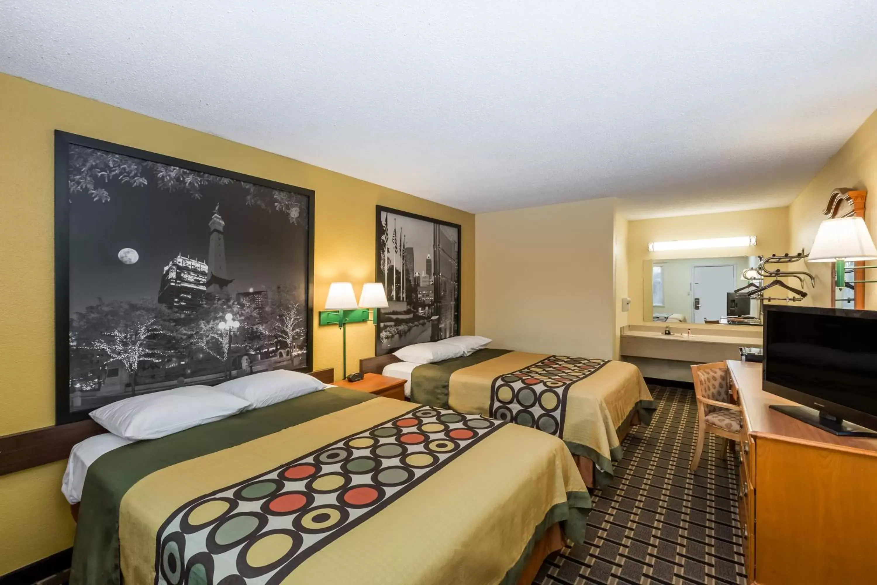 Bed in Super 8 by Wyndham Indianapolis-Southport Rd