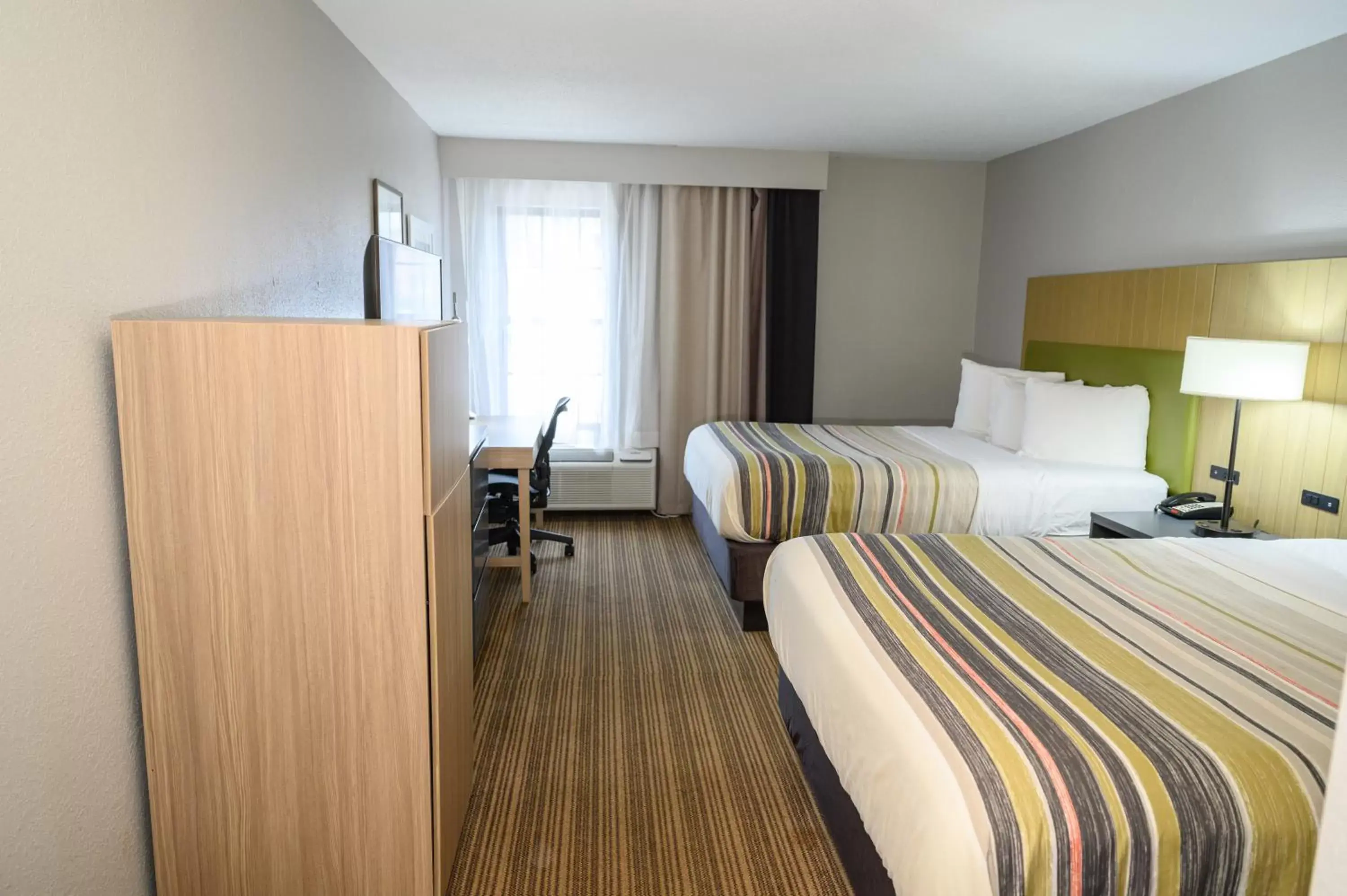 Queen Room with Two Queen Beds in Country Inn & Suites by Radisson, Greenfield, IN Queen Room with Two Queen Beds in Country Inn & Suites by Radisson, Greenfield, IN