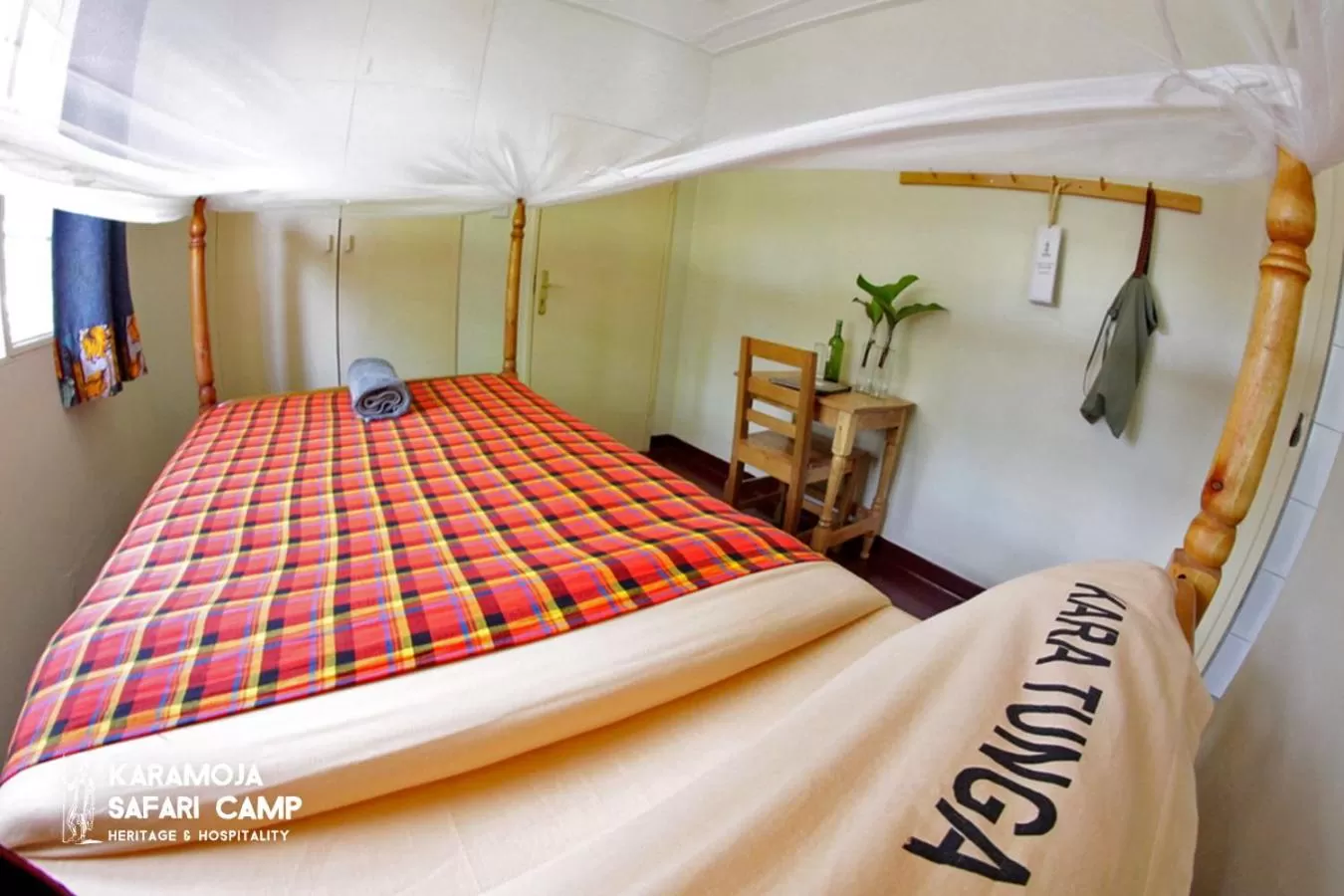 Bed in Kara-Tunga Safari Camp