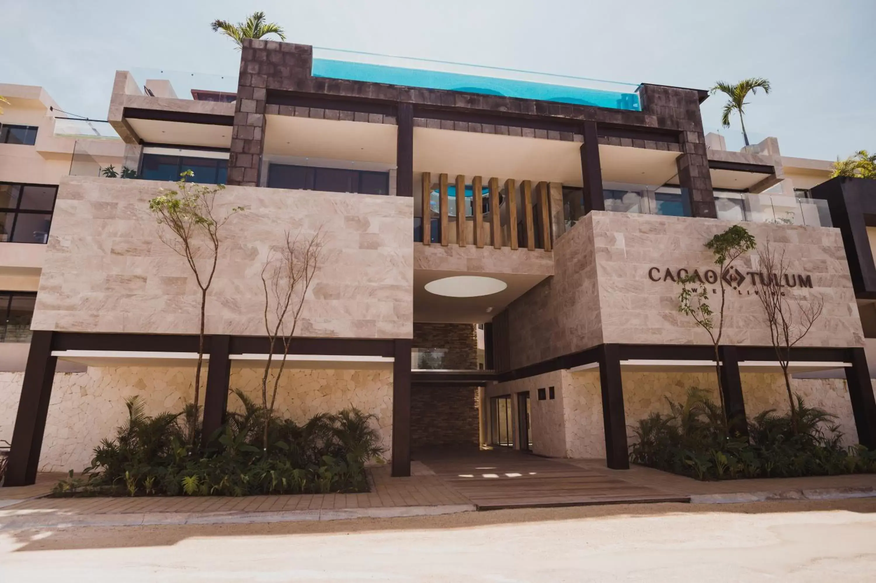 Facade/entrance, Property Building in Cacao Tulum -Luxury Condos-