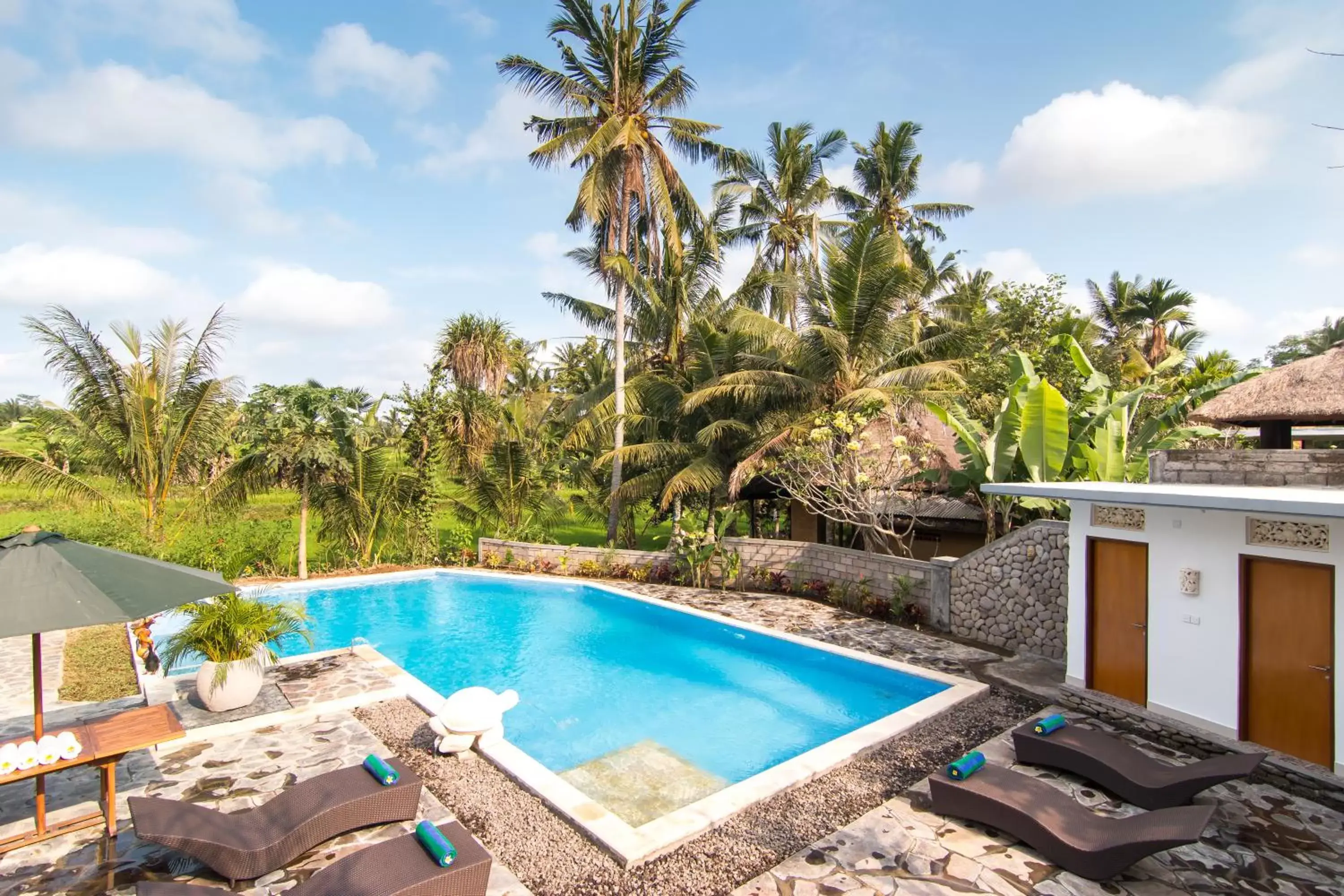 Swimming pool in Gita Maha Ubud Hotel by Mahaputra-CHSE Certified