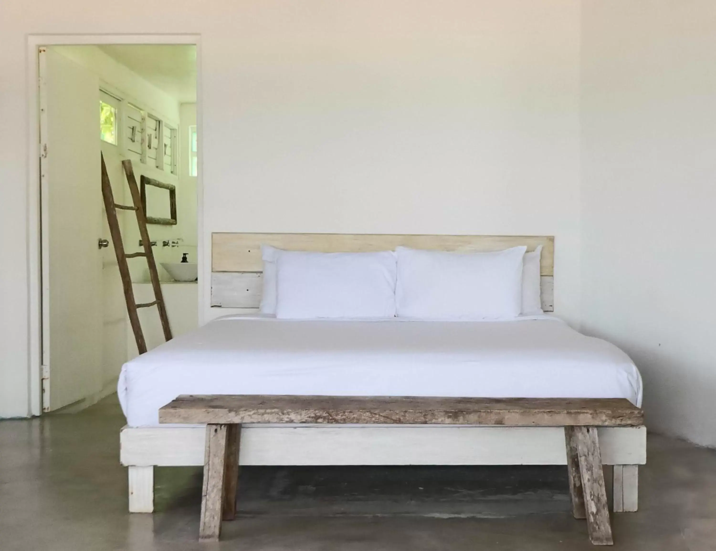 Bed in Tuup Tulum Oceanfront or road side rooms