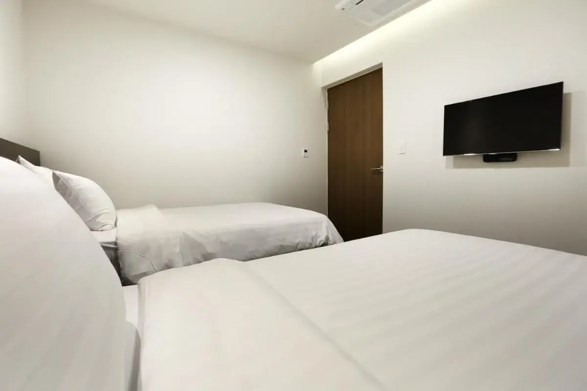 Bed in Uni Hotel Jeju