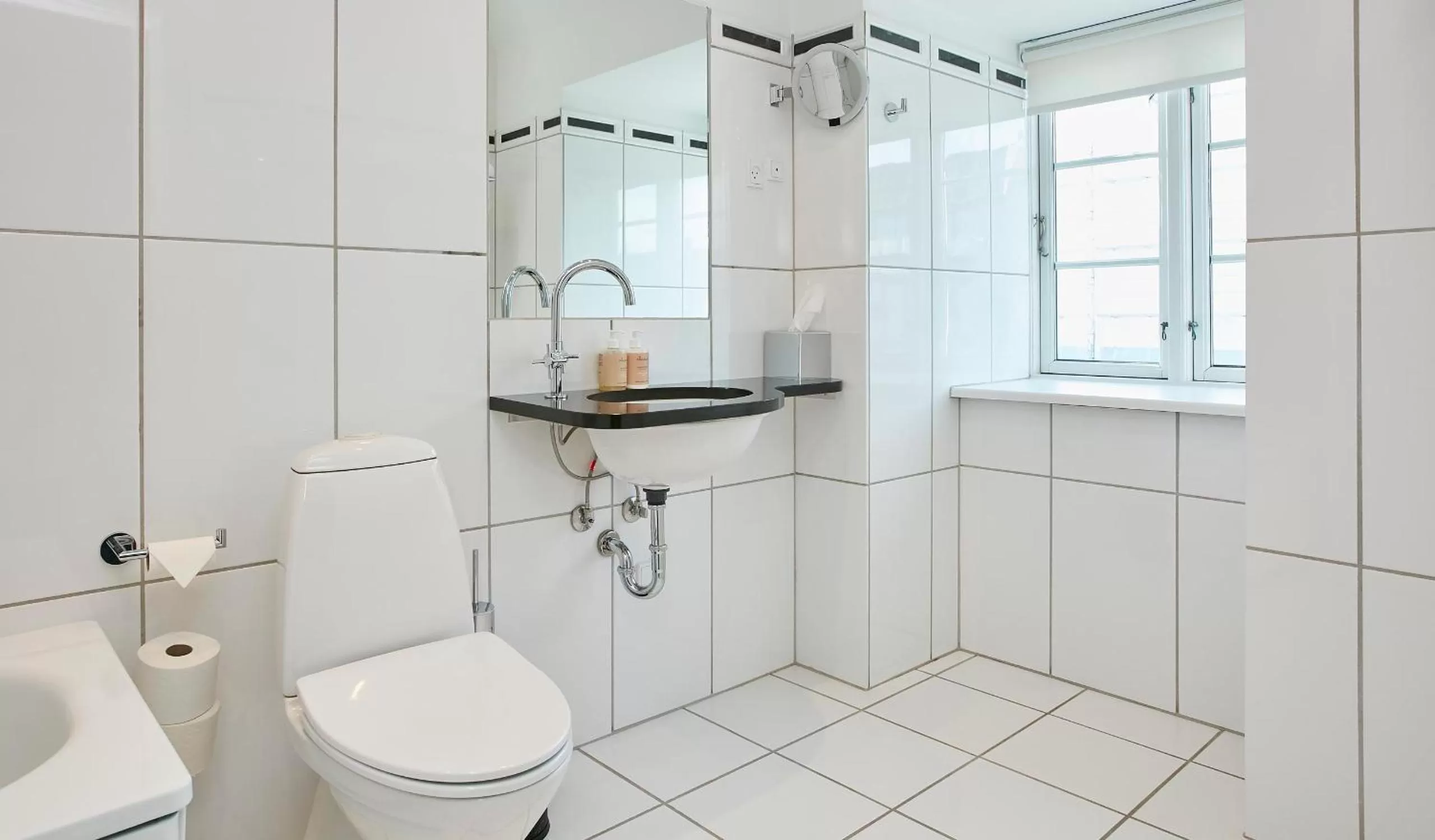 Bathroom in Jørgensens Hotel