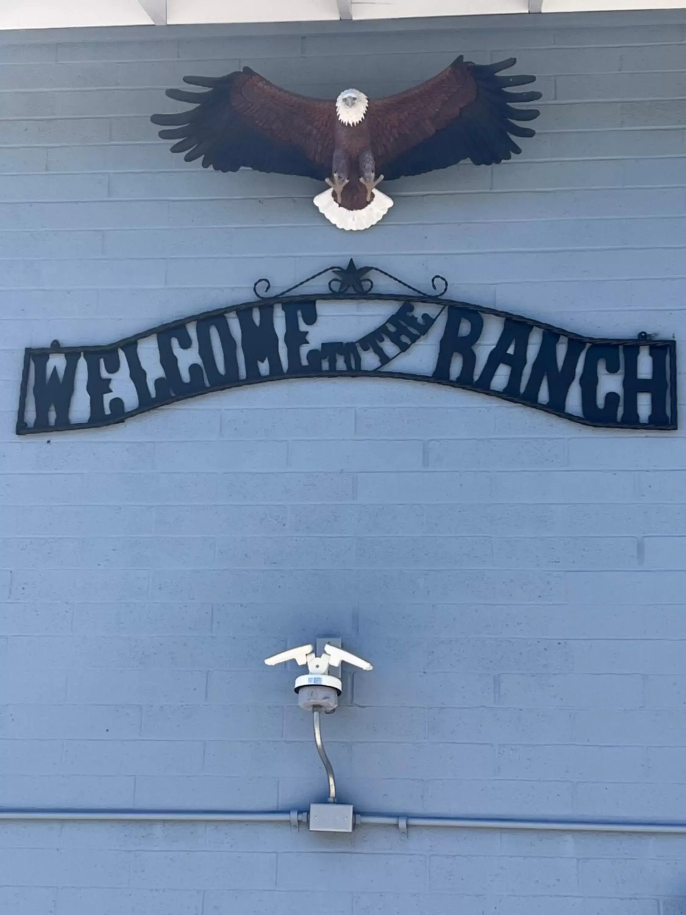 Property logo or sign in El Rancho Motel