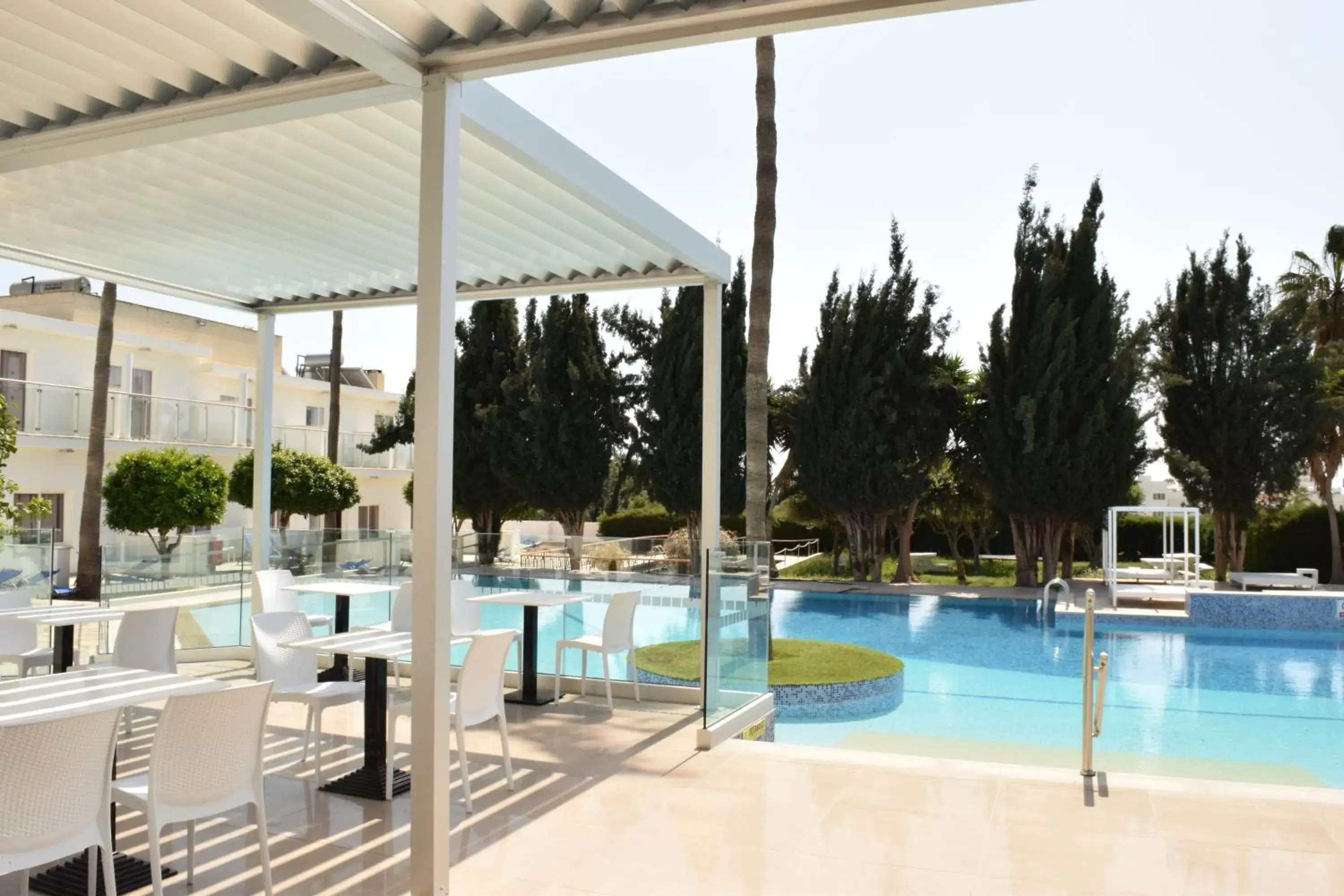 Patio, Swimming Pool in Fedrania Gardens Hotel