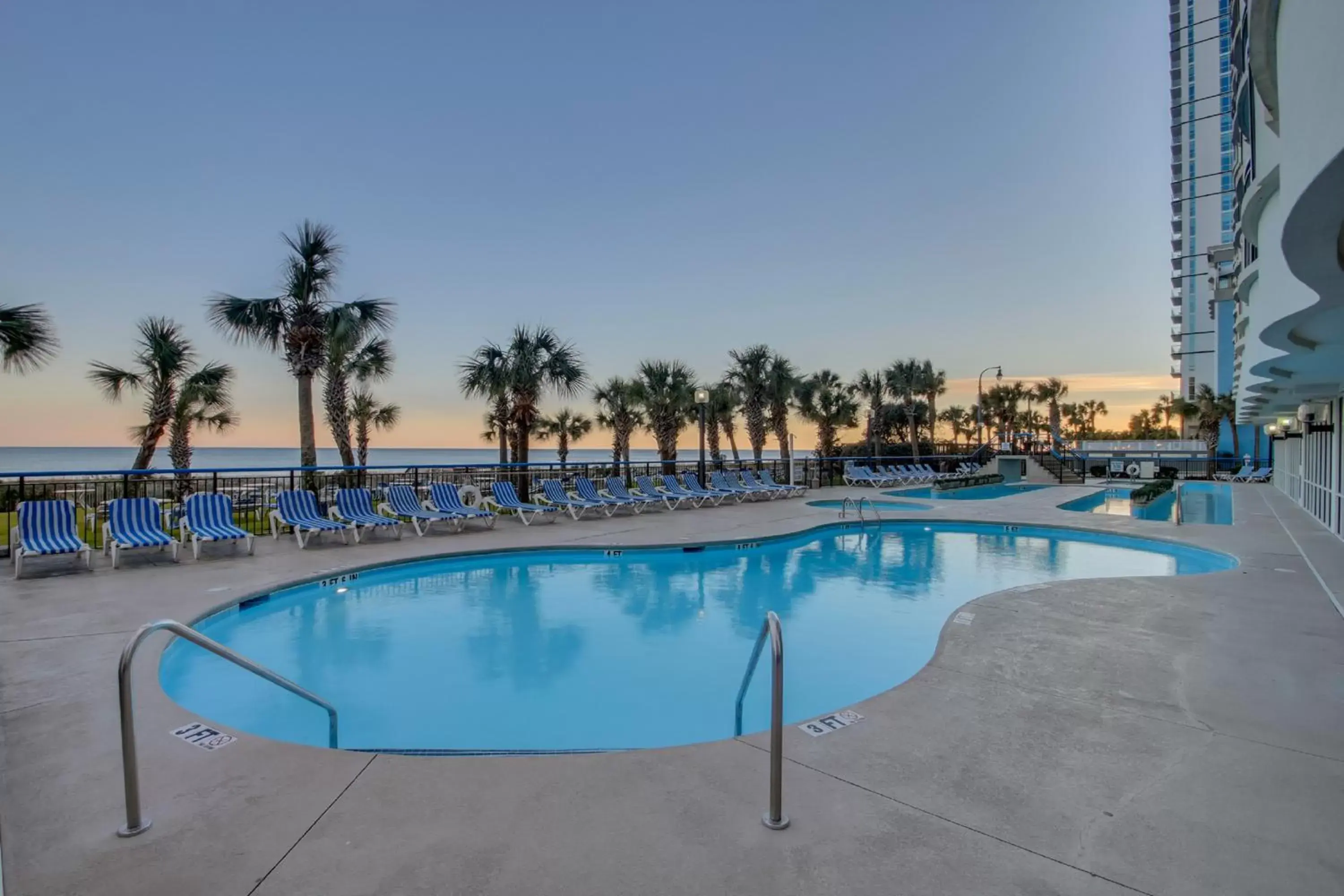 Swimming Pool in Boardwalk Beach Resort Condo w Oceanfront Balcony