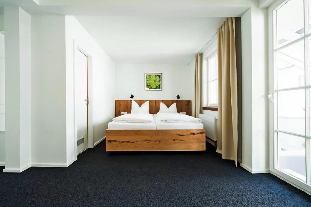 Photo of the whole room, Bed in Stadthotel Waldhorn