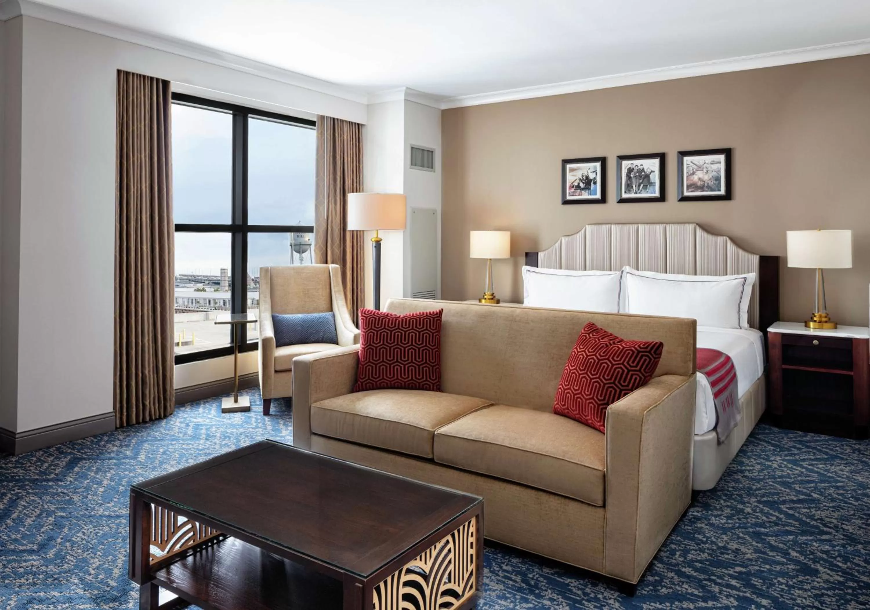 Living room, Bed in The Higgins Hotel New Orleans, Curio Collection by Hilton