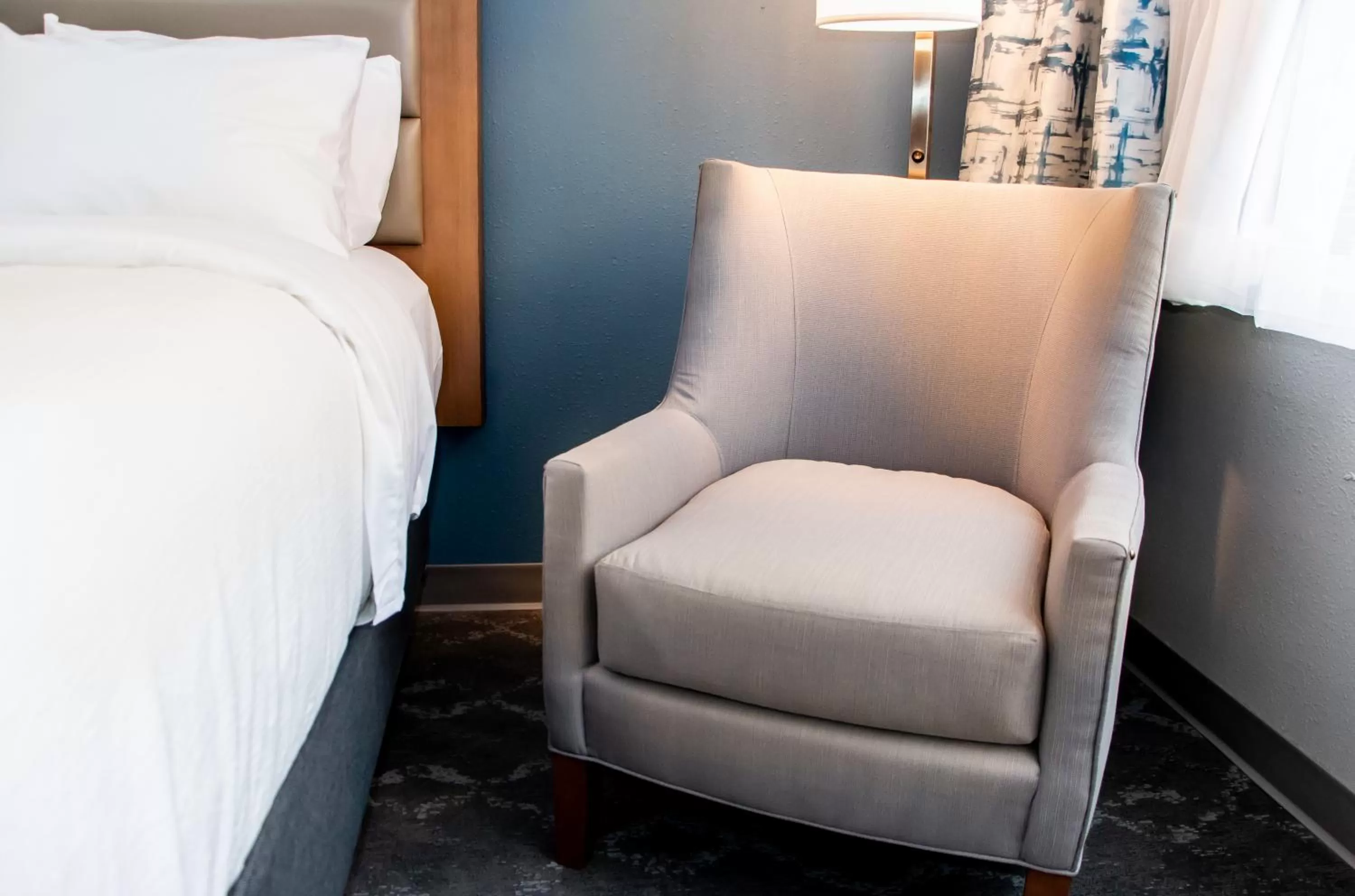 Seating area, Bed in Radisson Hotel and Conference Center Fond du Lac