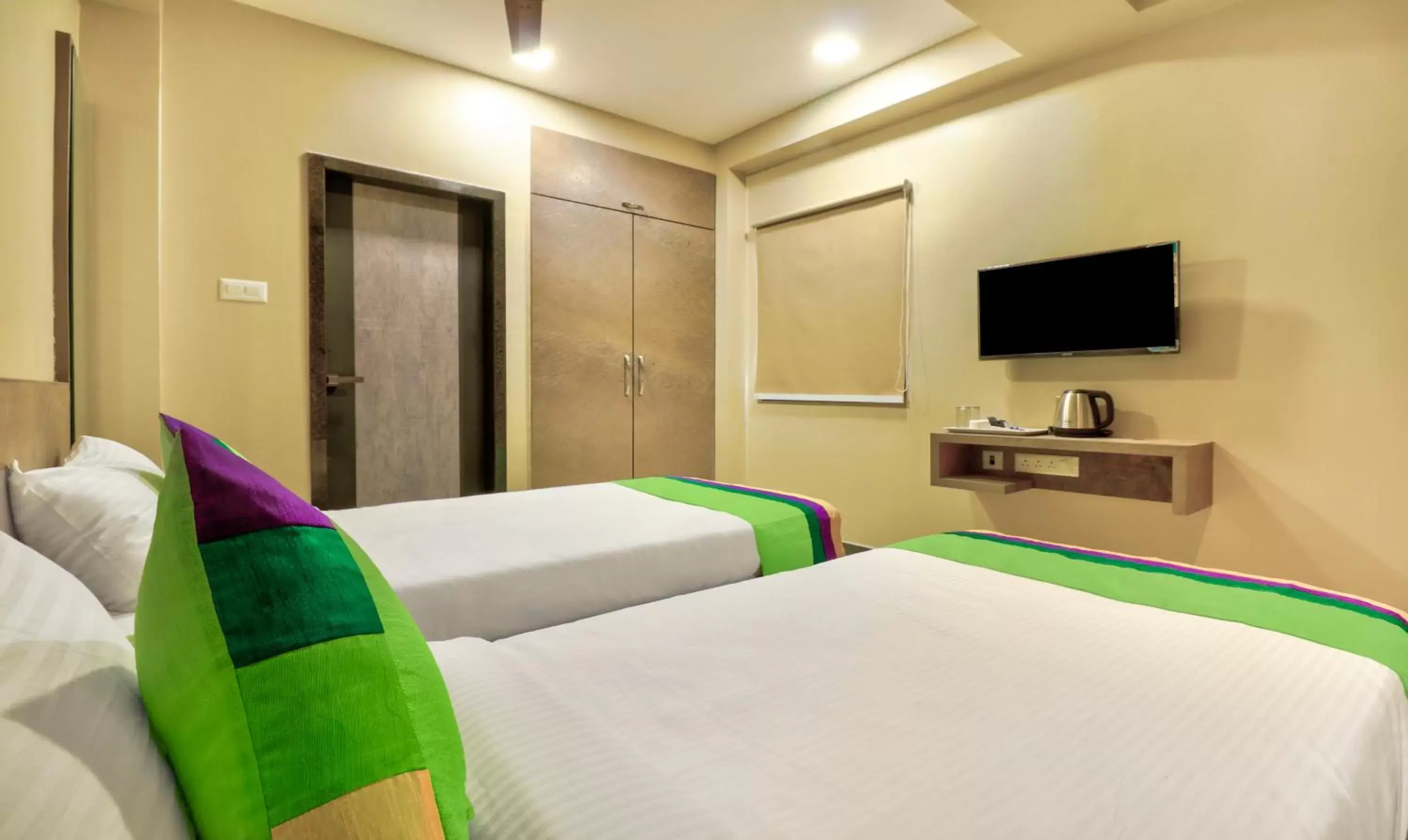 Bedroom, Bed in Treebo Sriz Cozy Seethamadhara Bedroom, Bed in Treebo Sriz Cozy Seethamadhara