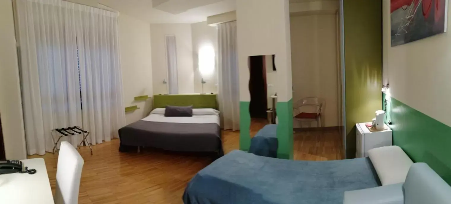 Photo of the whole room, Bed in MiHotel