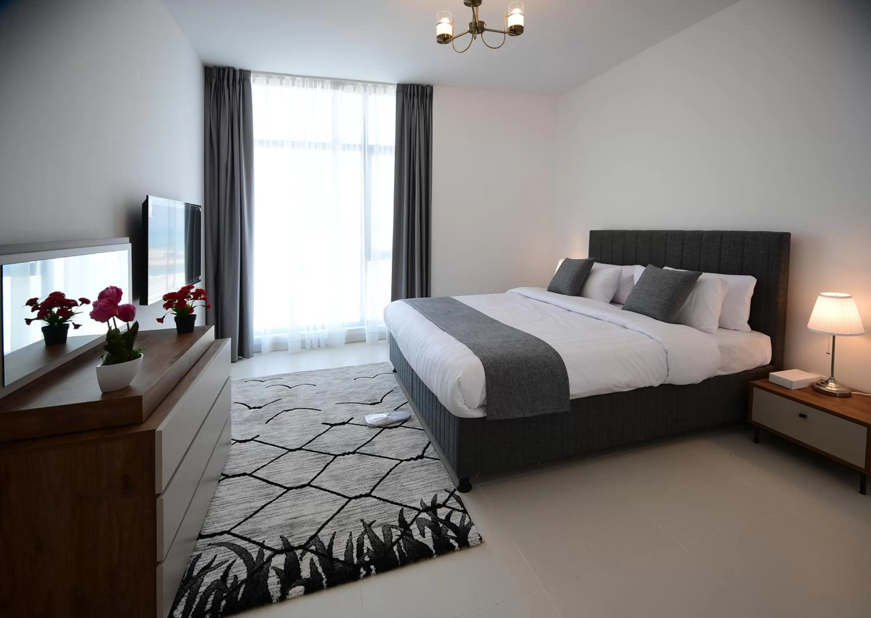 Bed in Noor Amwaj Hotel & Apartment