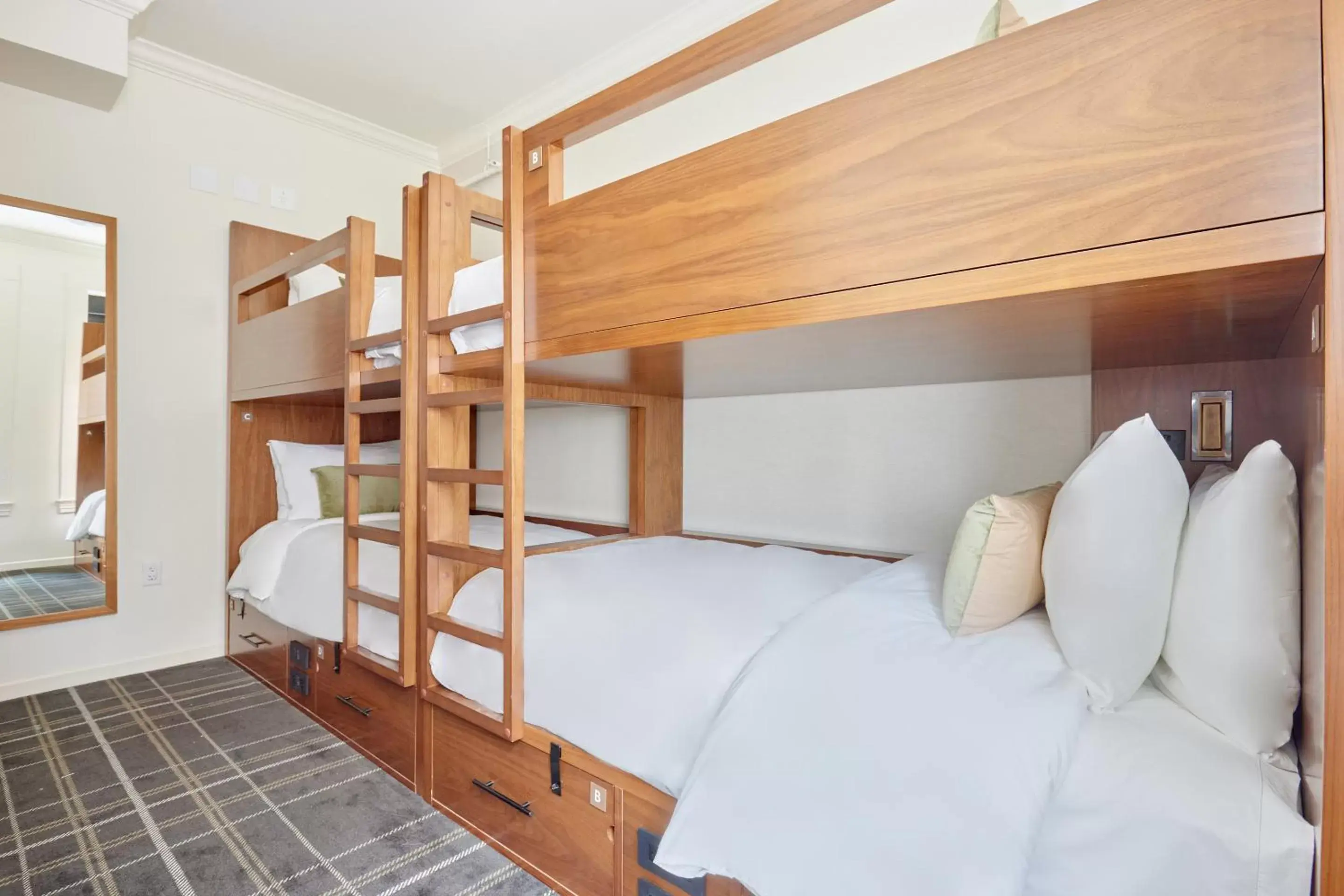 Living room, Bed in FOUND Hotel, San Francisco Living room, Bed in FOUND Hotel, San Francisco