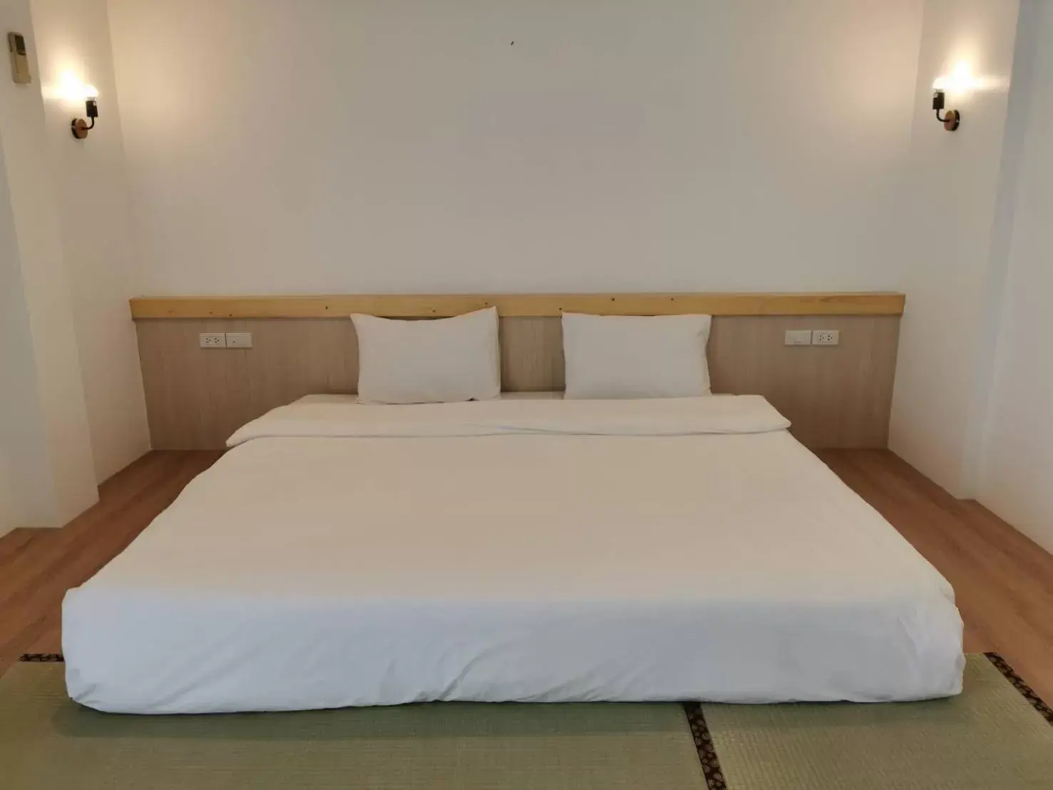 Bed in BaanBusarin Hotel