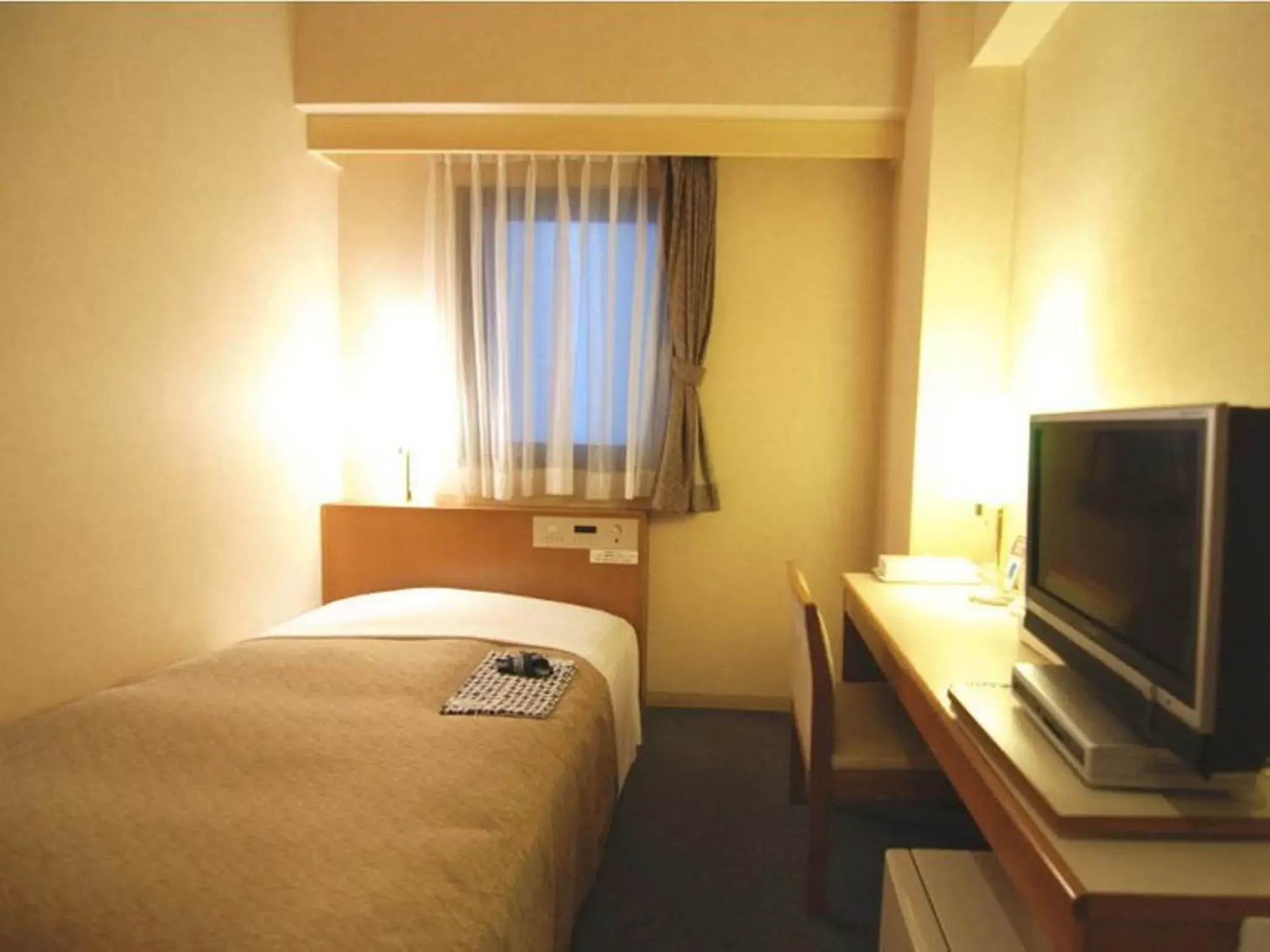 Photo of the whole room, Bed in Hotel New Star Ikebukuro