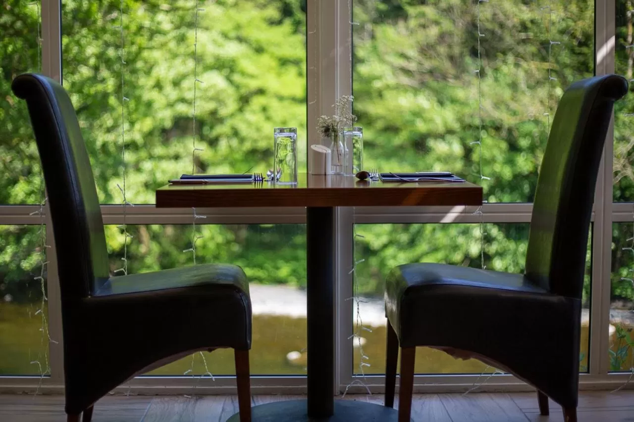 Dining area in Craig-y-Dderwen Riverside Hotel