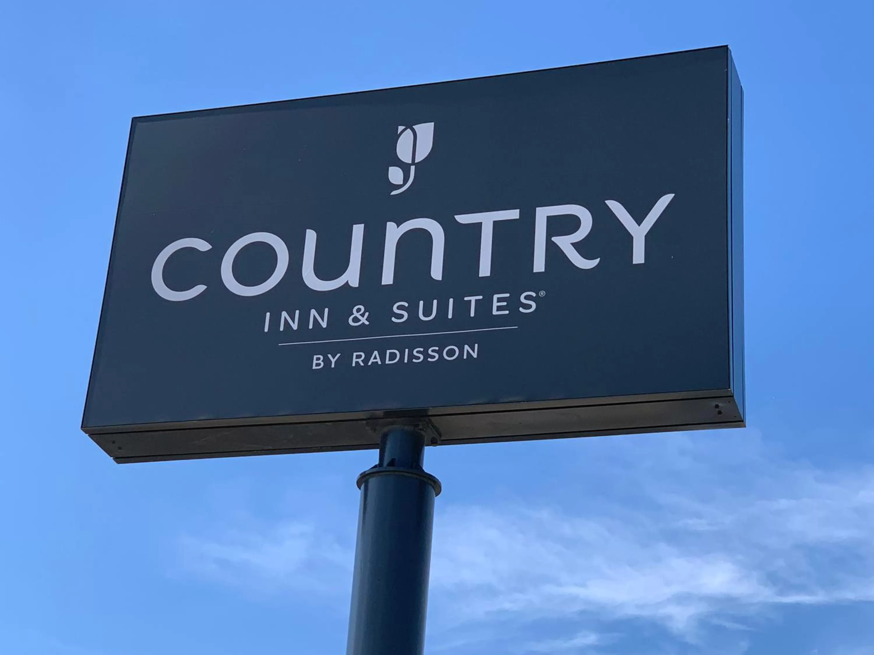 Property logo or sign in Country Inn & Suites by Radisson, Tulsa, OK