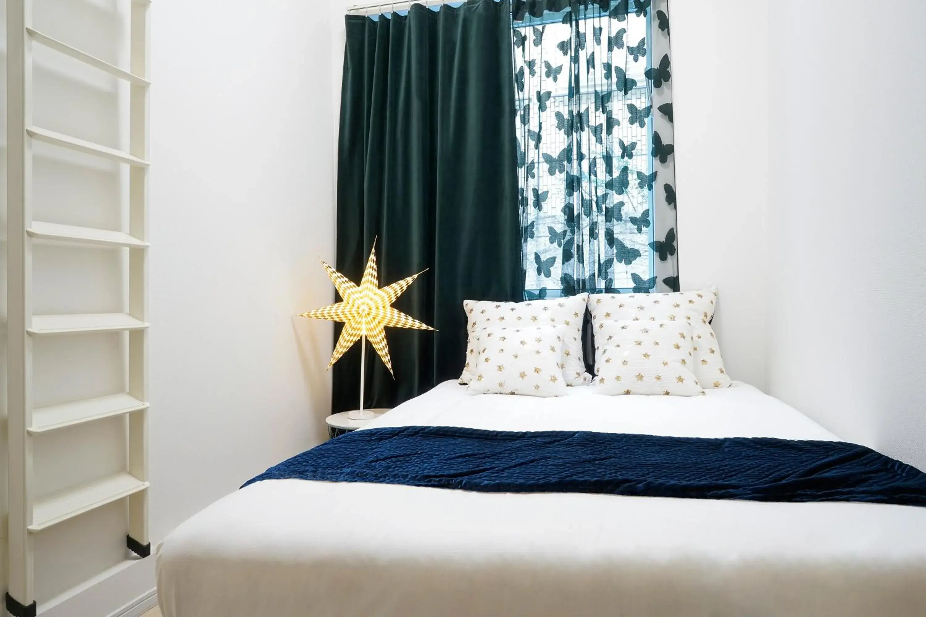 Bed in Blue Empire Hotel Bed in Blue Empire Hotel