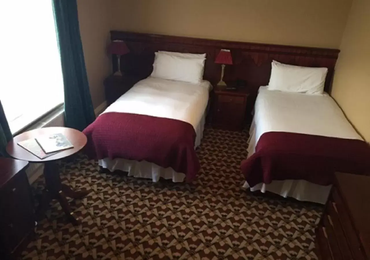 Bed in Riverbank House Hotel