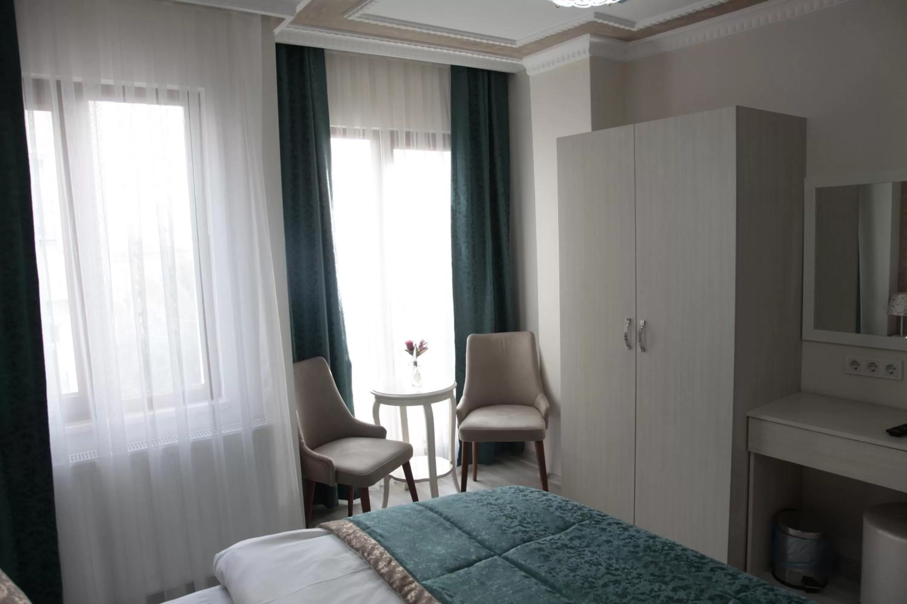 Decorative detail, Bed in Atam Suites