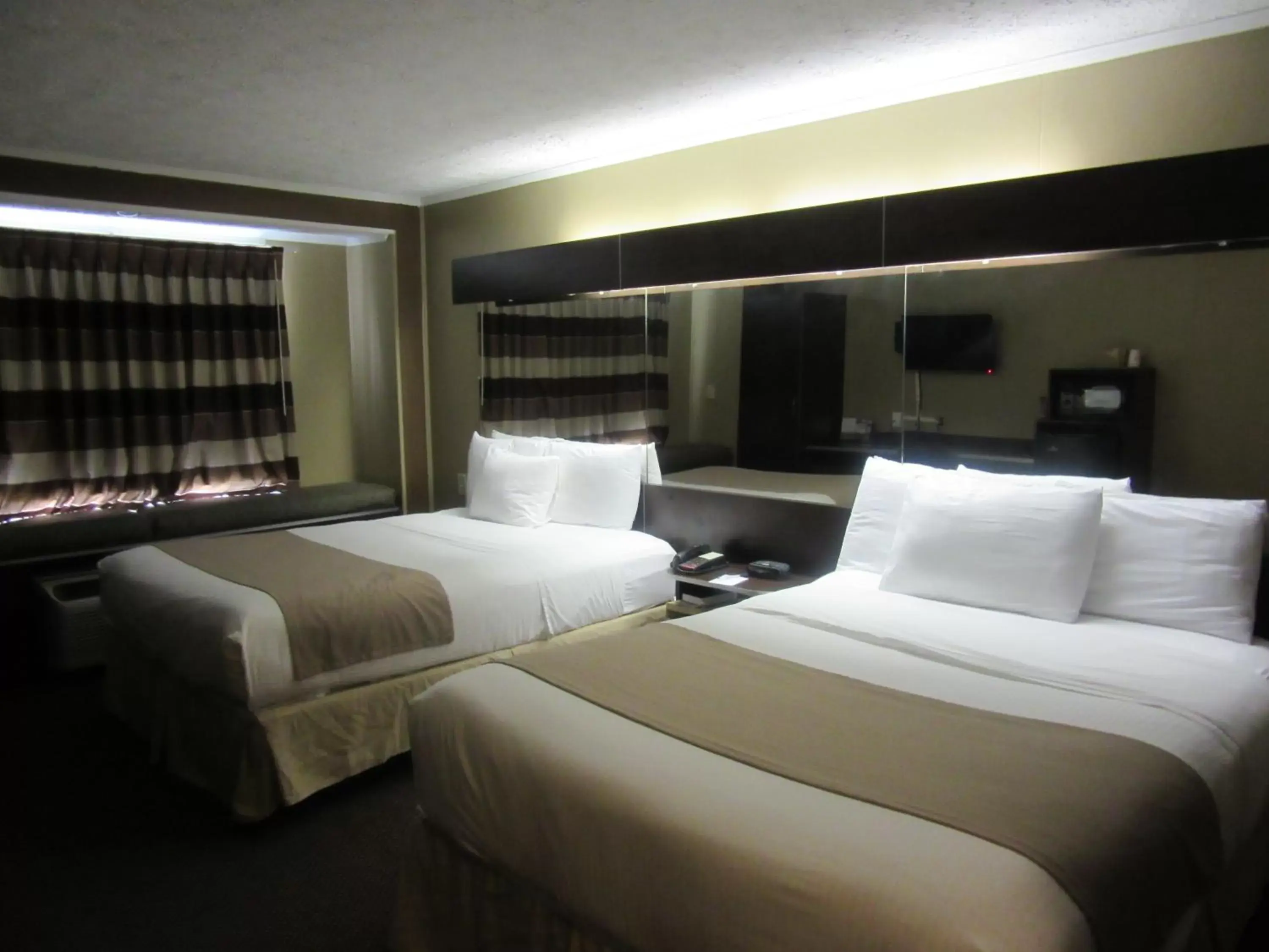 Bed in Microtel Inn & Suites by Wyndham Columbia Fort Jackson N