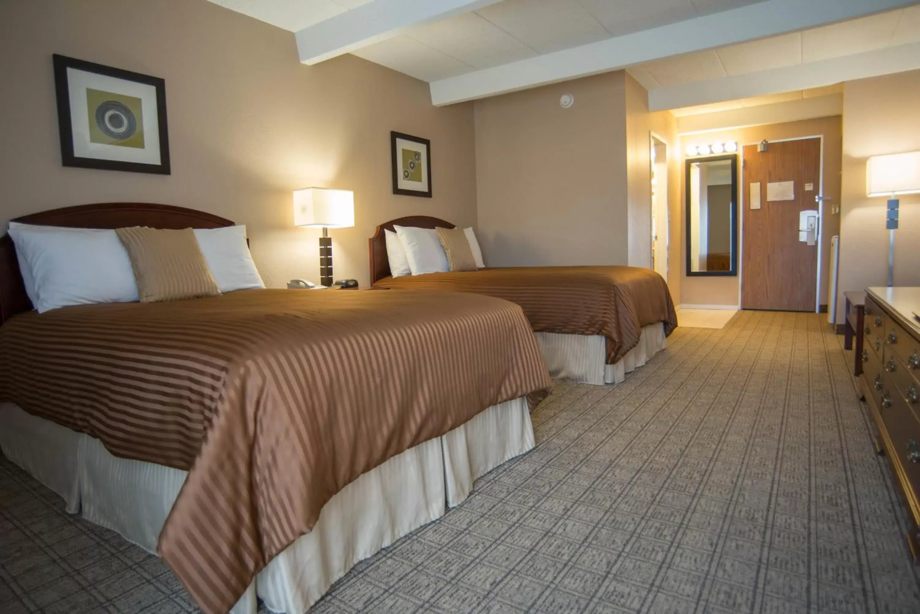 Bedroom, Bed in Eastland Suites Extended Stay Hotel & Conference Center Urbana