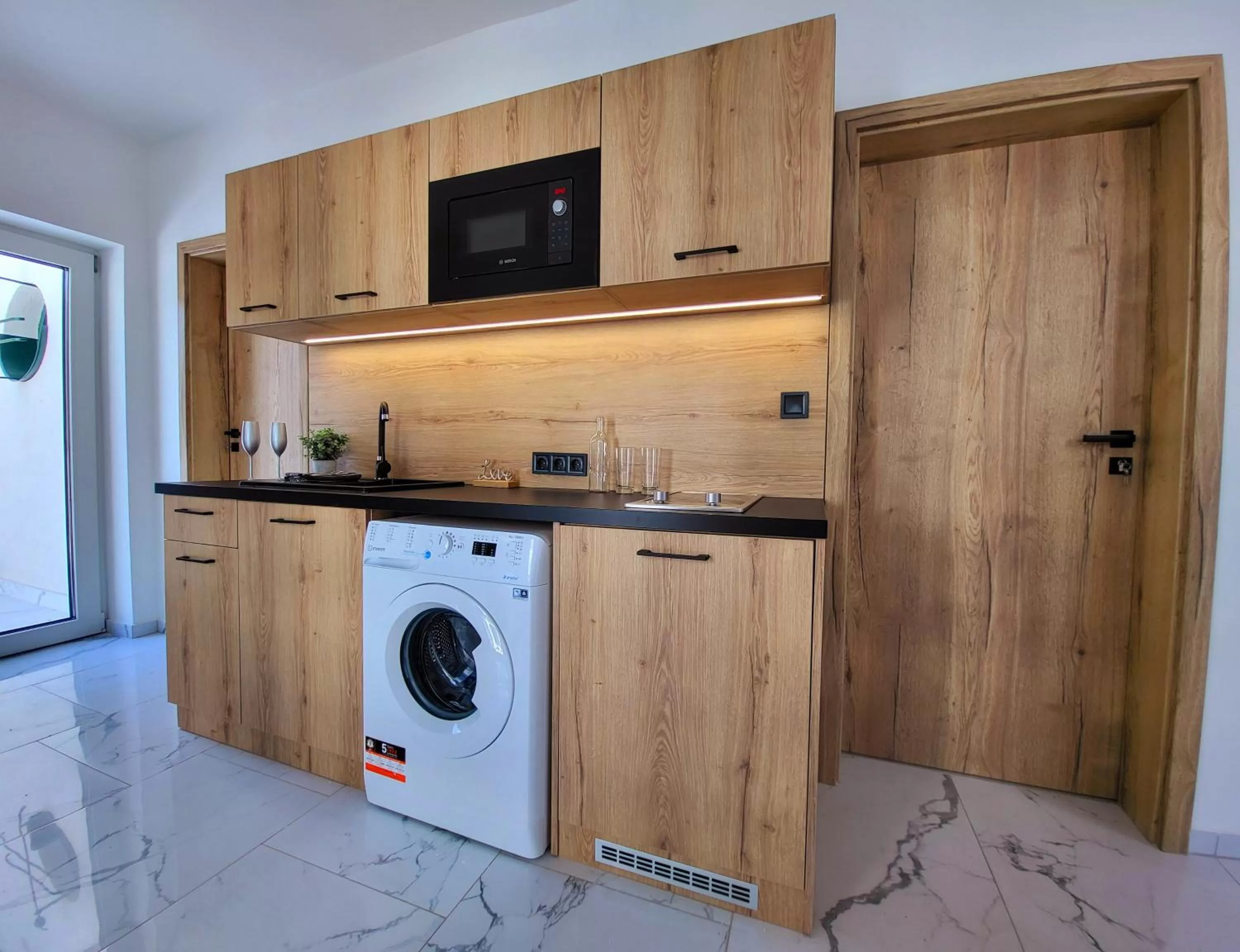 Kitchen/Kitchenette in Villa Bauhaus Wellness Apart-Hotel