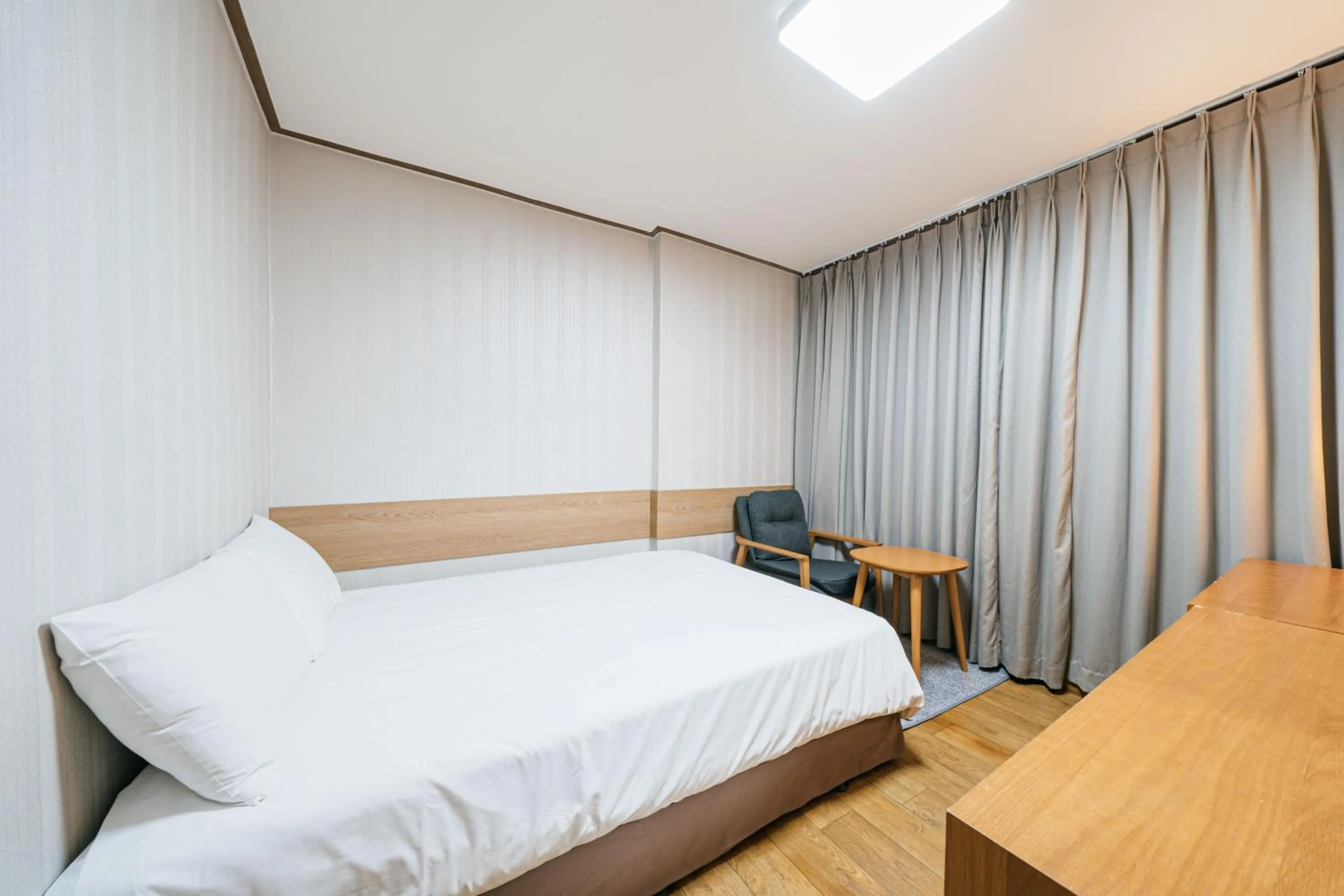 Bed in Jeju Miracle Hotel