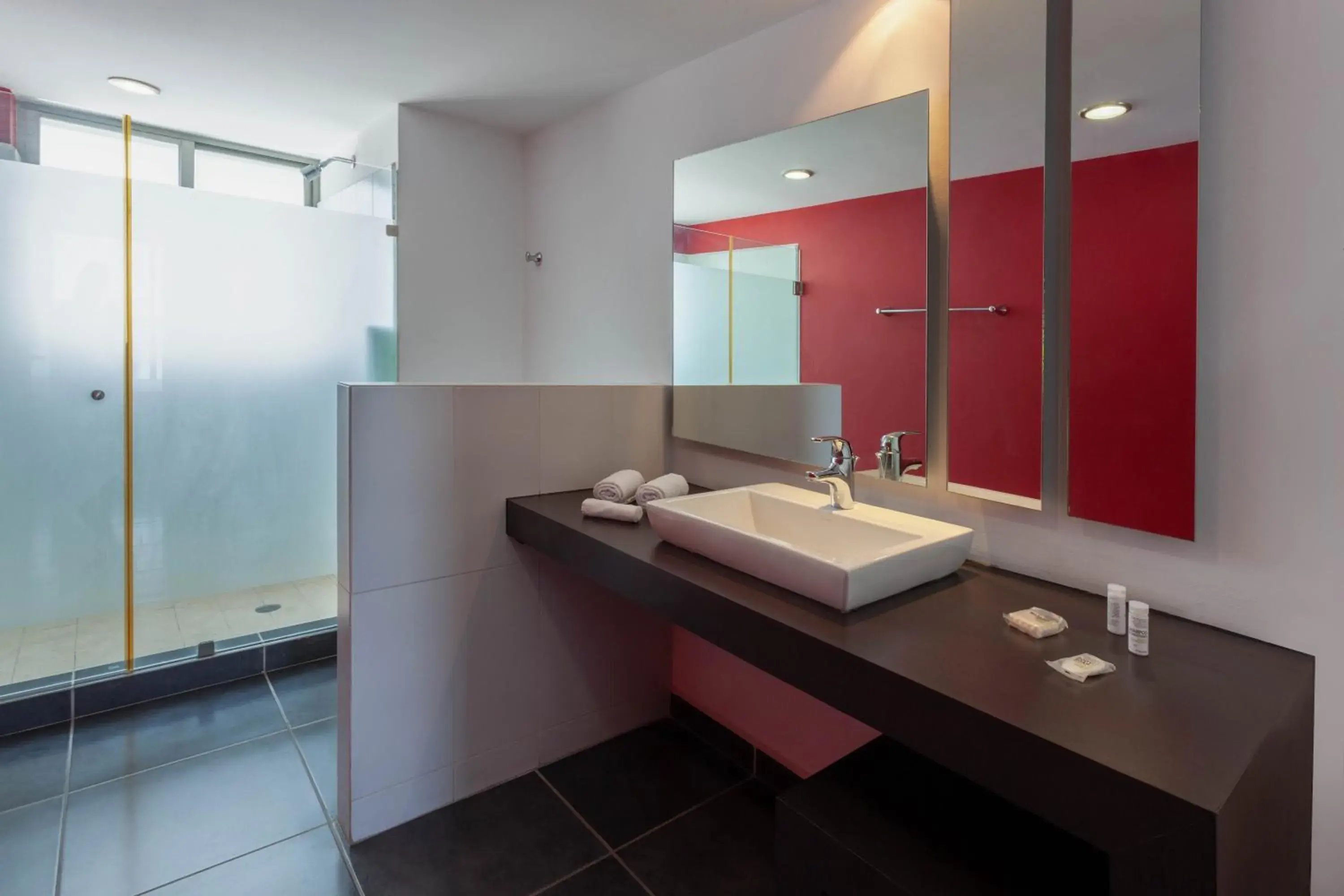 Bathroom in Ramada by Wyndham Acapulco Hotel & Suites