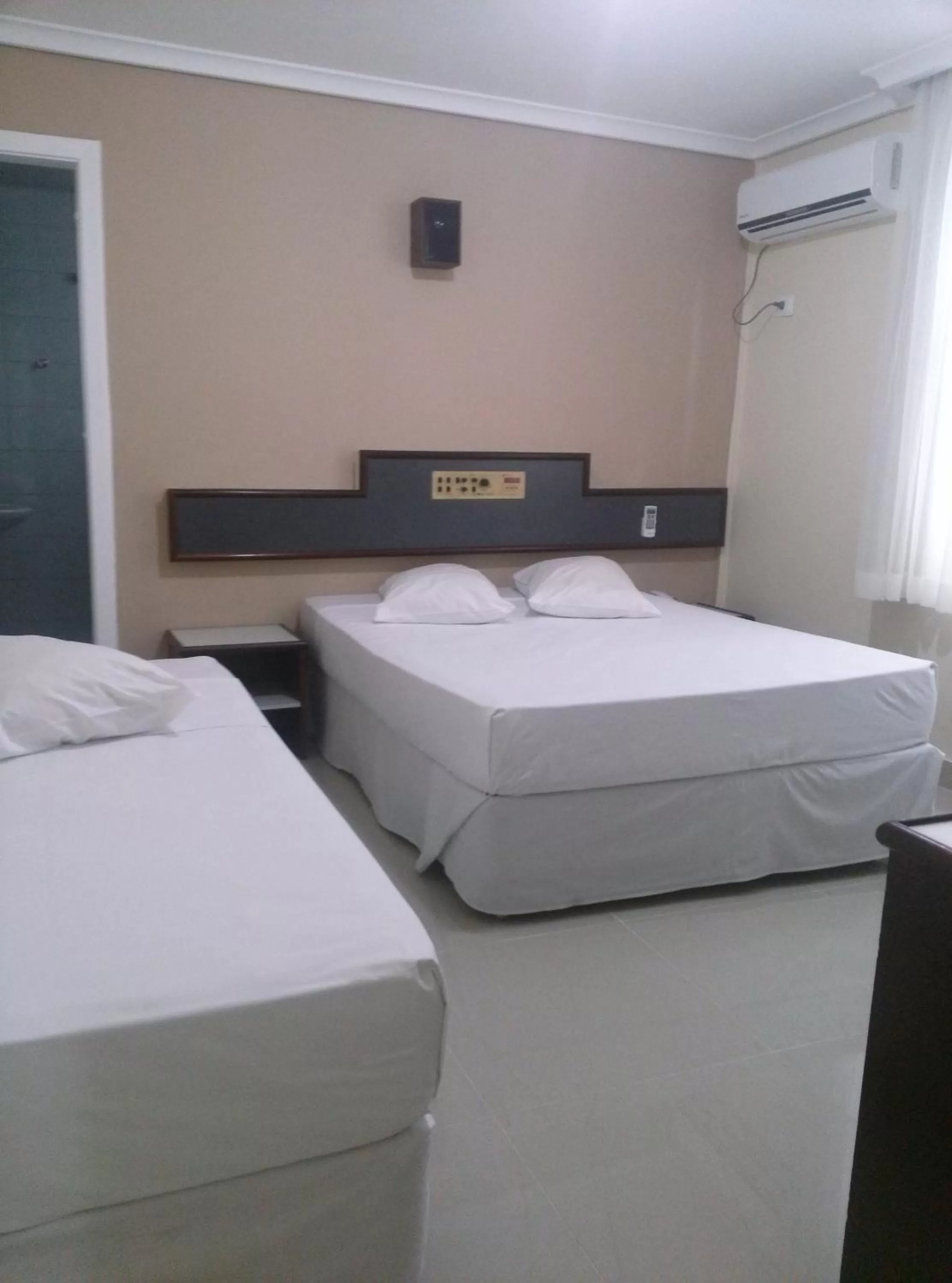 Bed in Hotel Estação Express