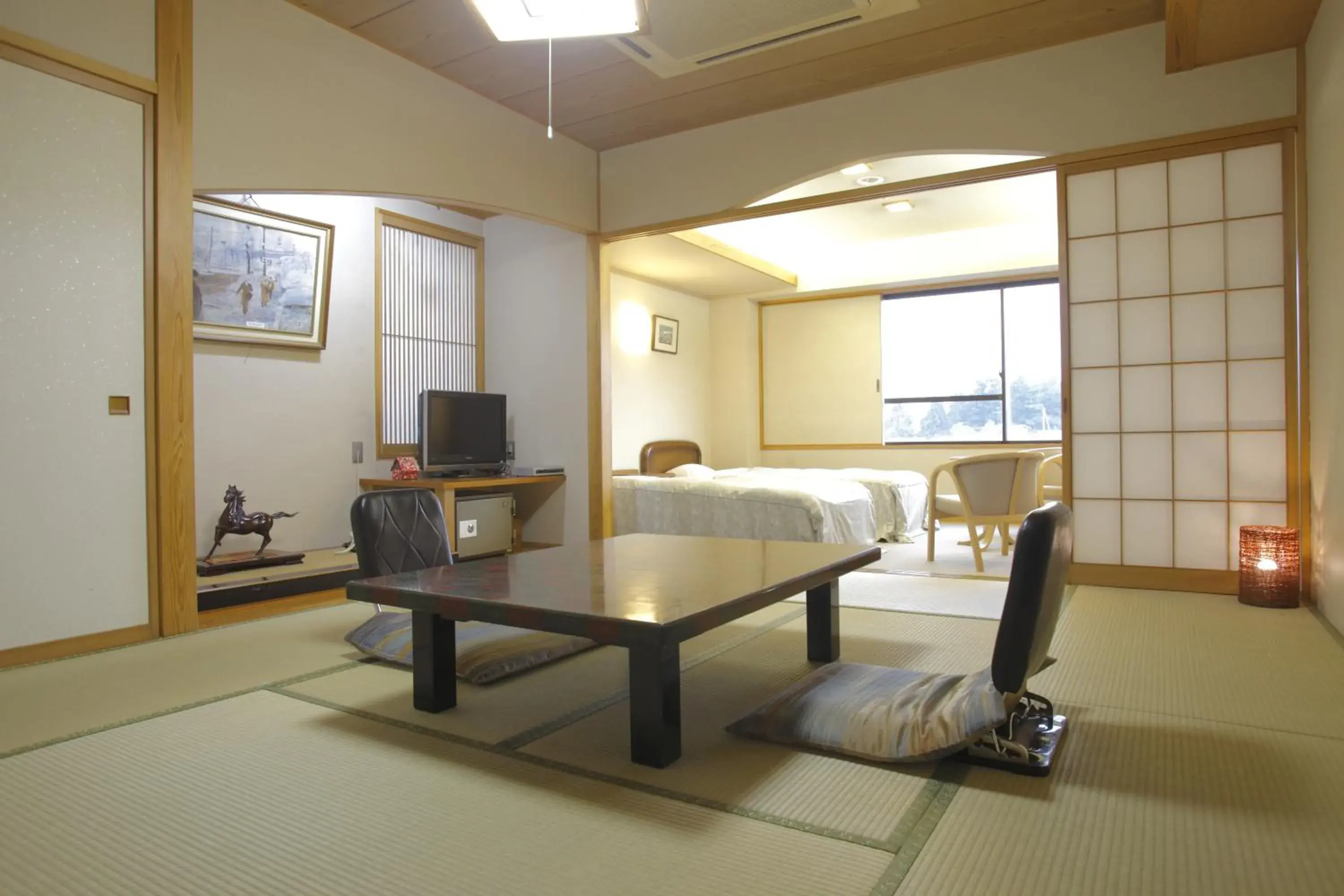 Photo of the whole room, Seating Area in Tenbourotennoyu Arimakan Ryokan