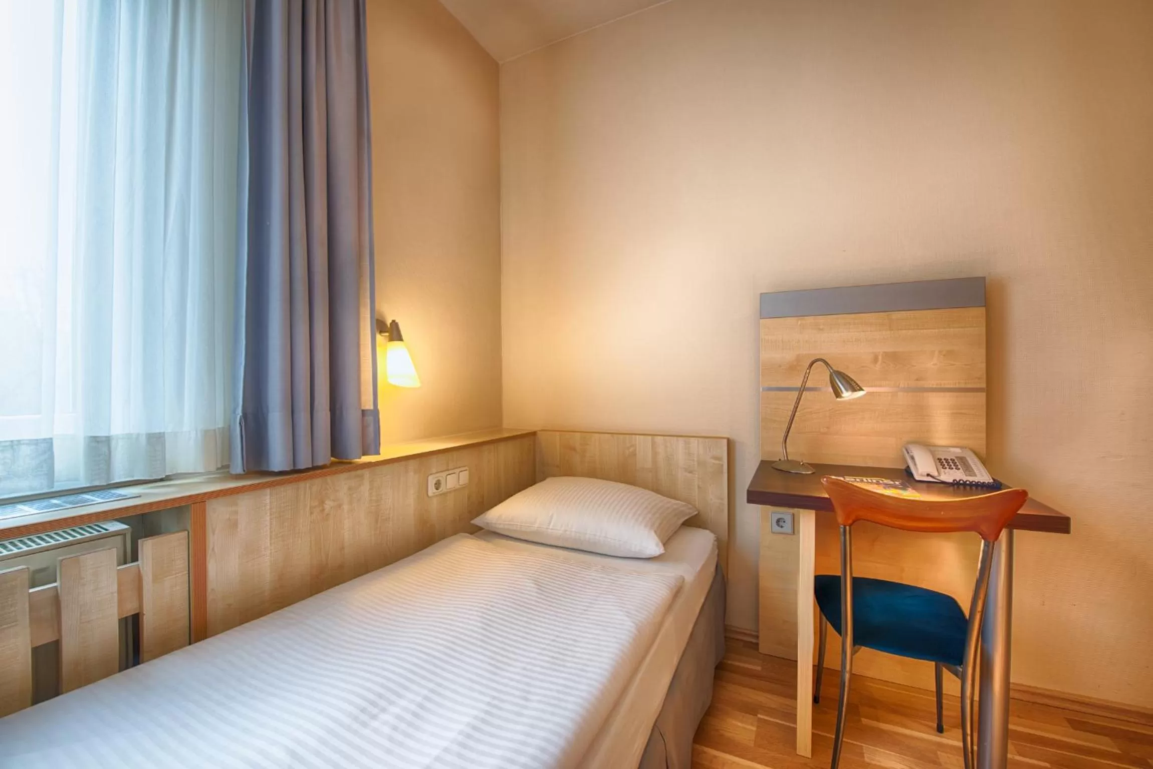 Photo of the whole room, Bed in enjoy hotel Berlin City Messe