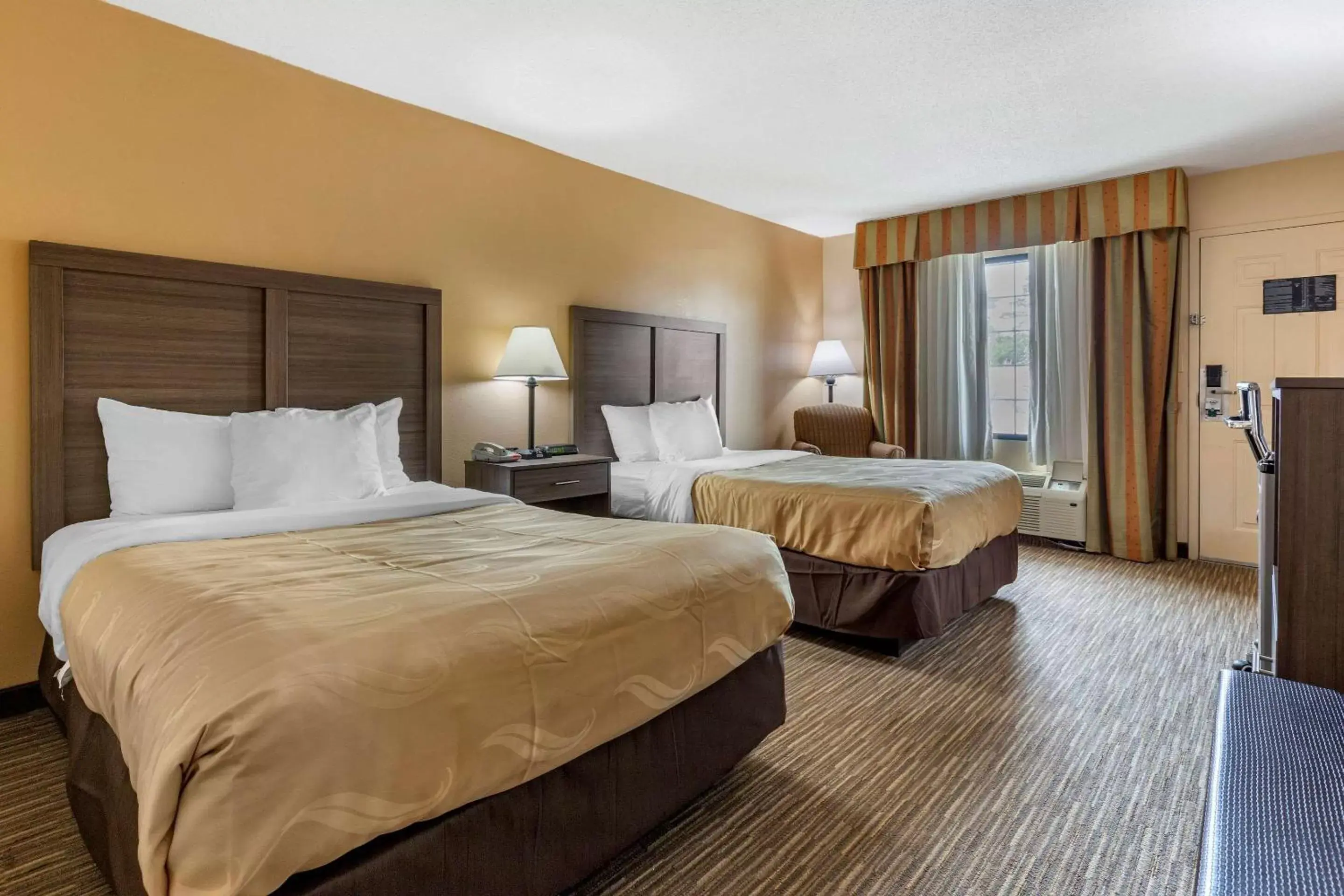 Photo of the whole room, Bed in Quality Inn & Suites Hanes Mall Photo of the whole room, Bed in Quality Inn & Suites Hanes Mall