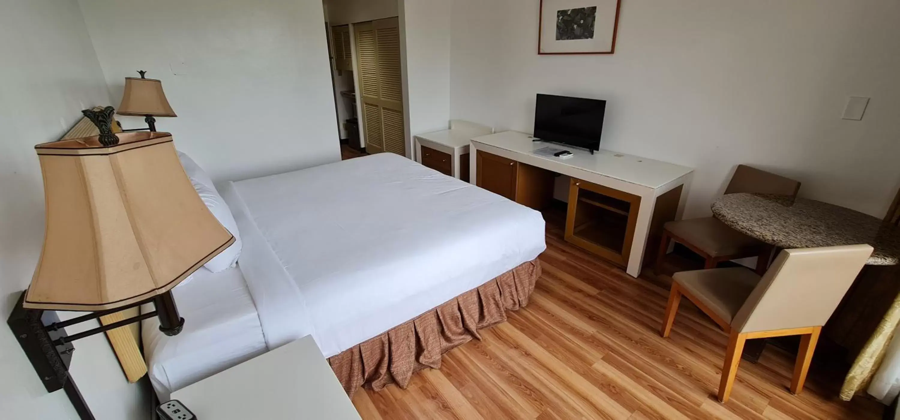 Bed in SureStay Hotel by Best Western Guam Palmridge