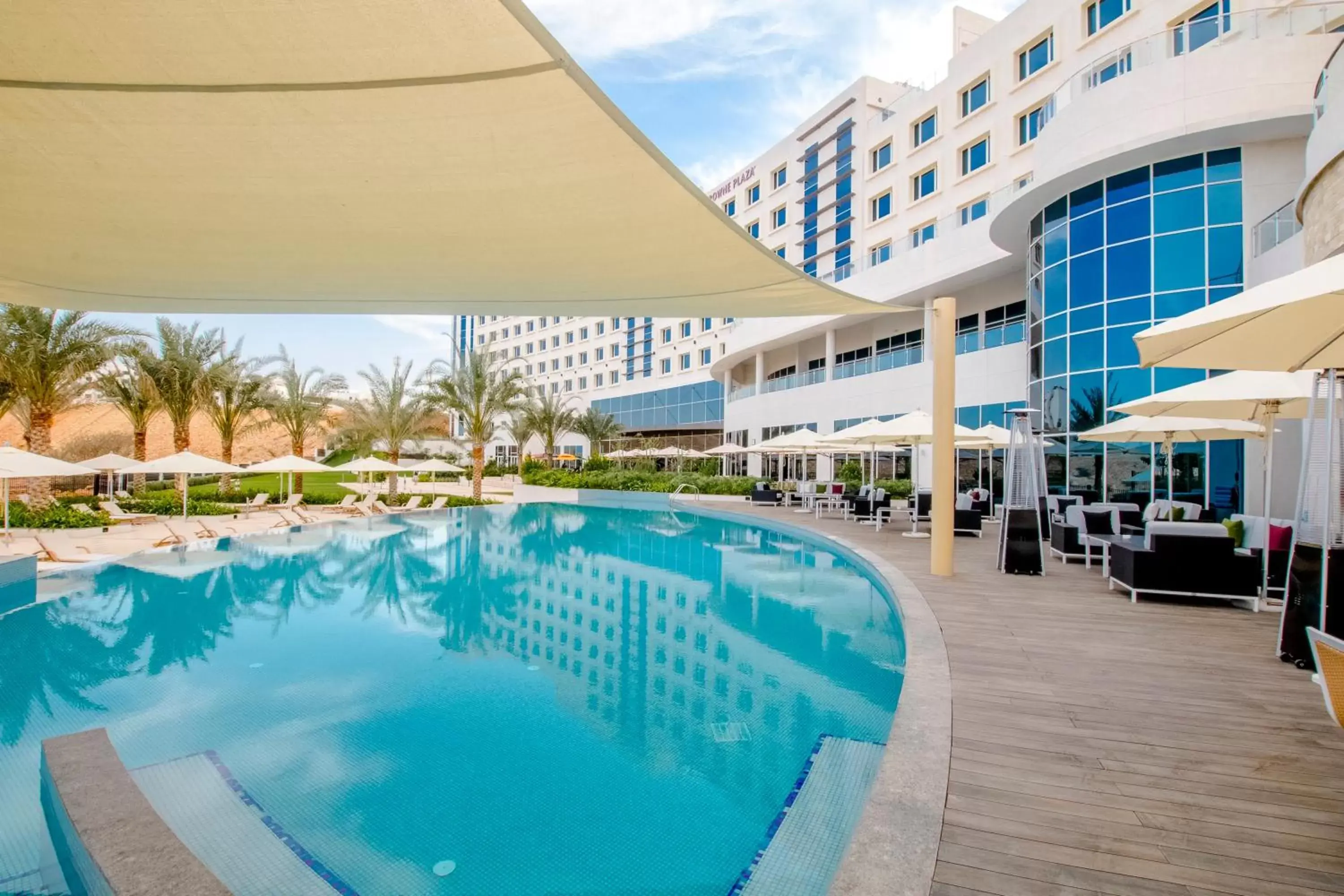Swimming Pool in Crowne Plaza Muscat OCEC, an IHG Hotel