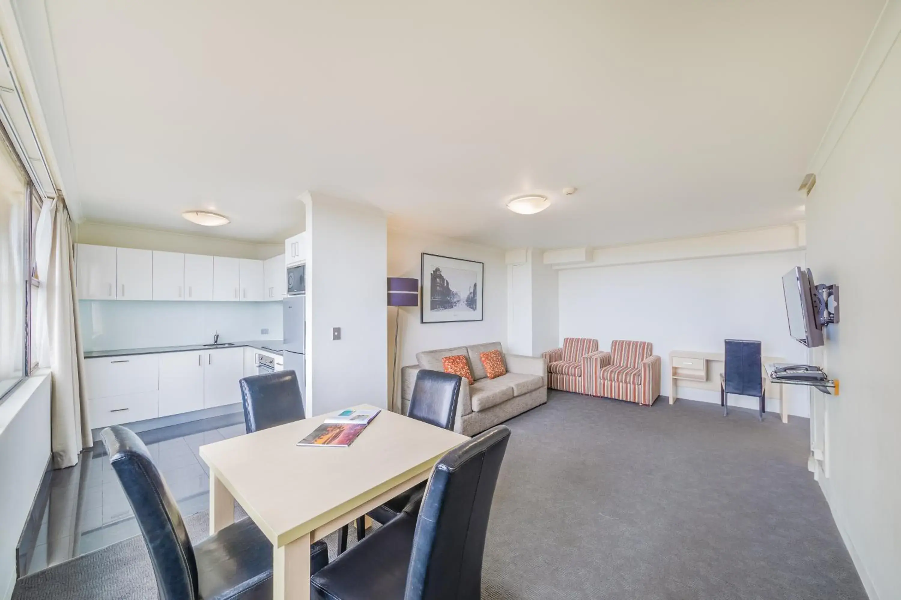 Living room, Dining Area in Oaks Sydney Hyde Park Suites