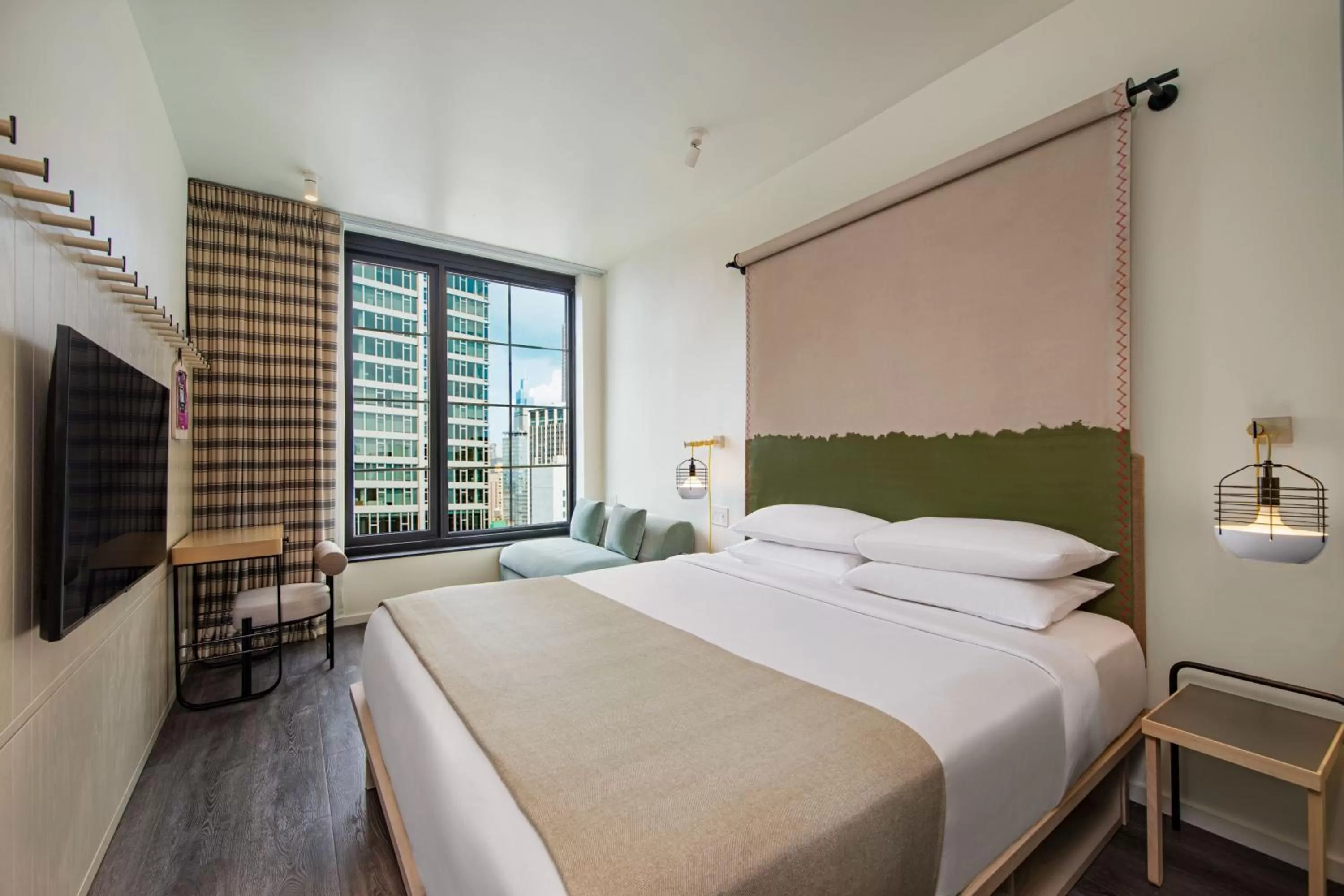 Photo of the whole room, Bed in Moxy NYC Chelsea