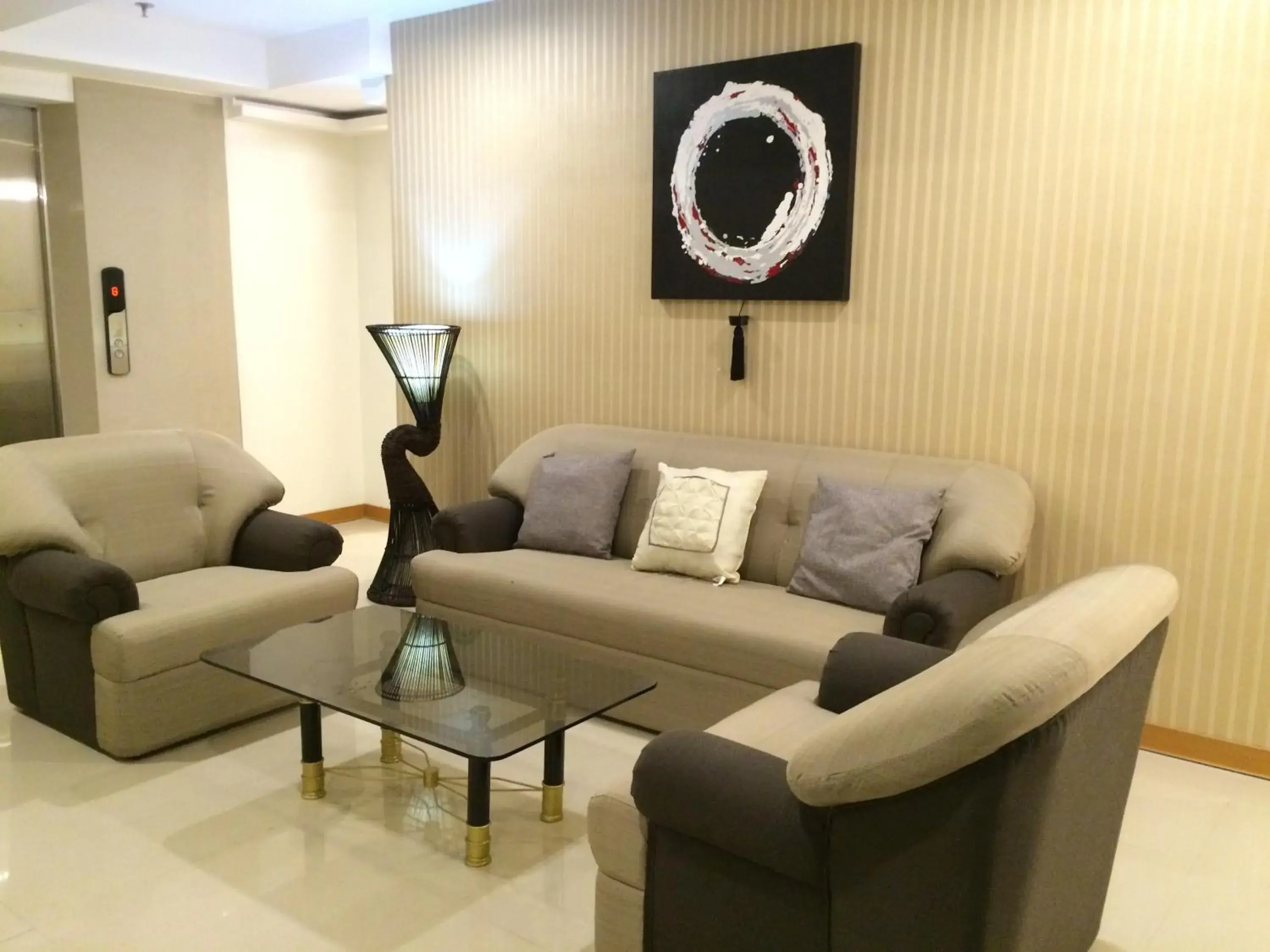 Communal lounge/ TV room, Seating Area in Stone House Hotel Pasay