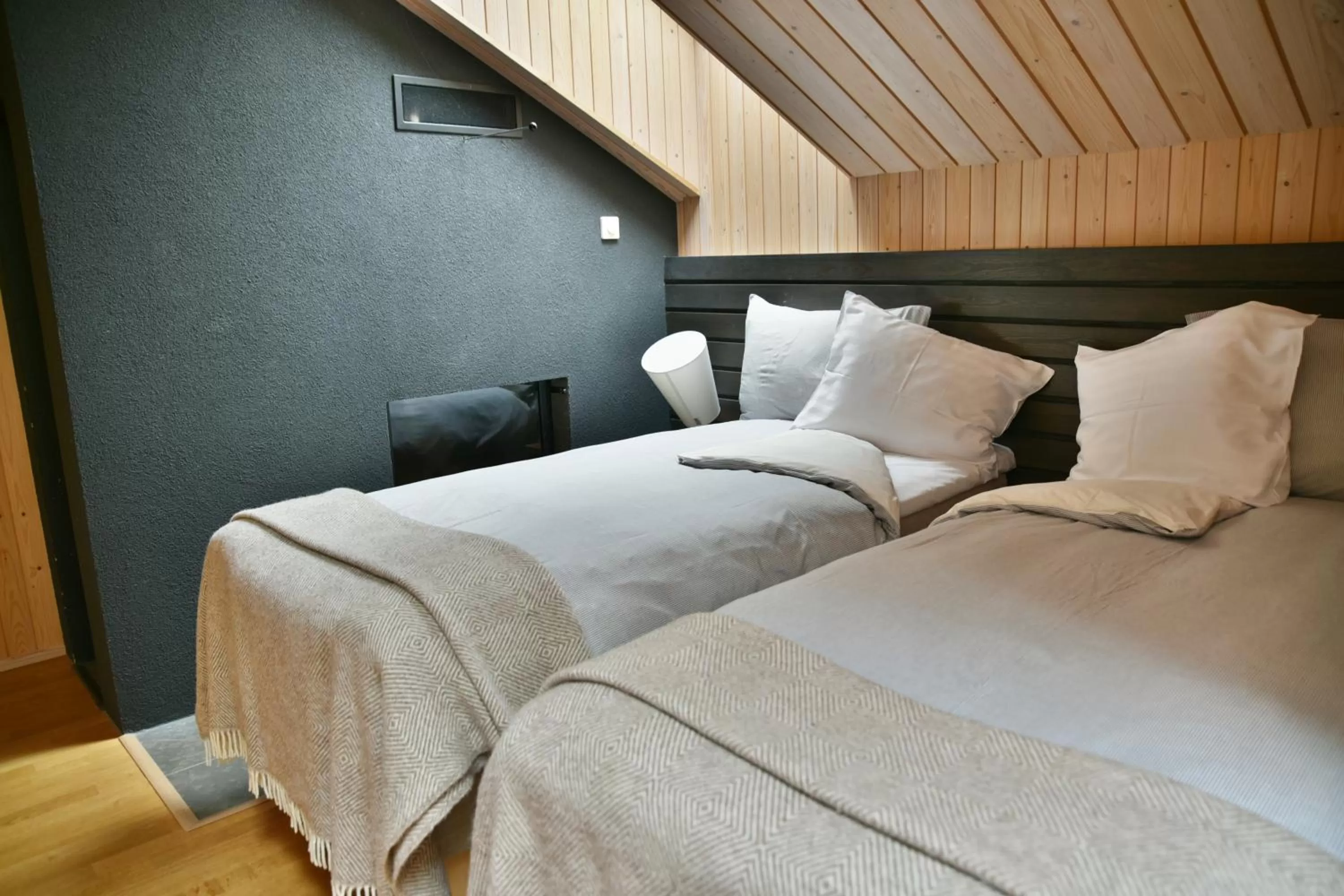 Bed in Saimaanranta Resort by Anttolanhovi