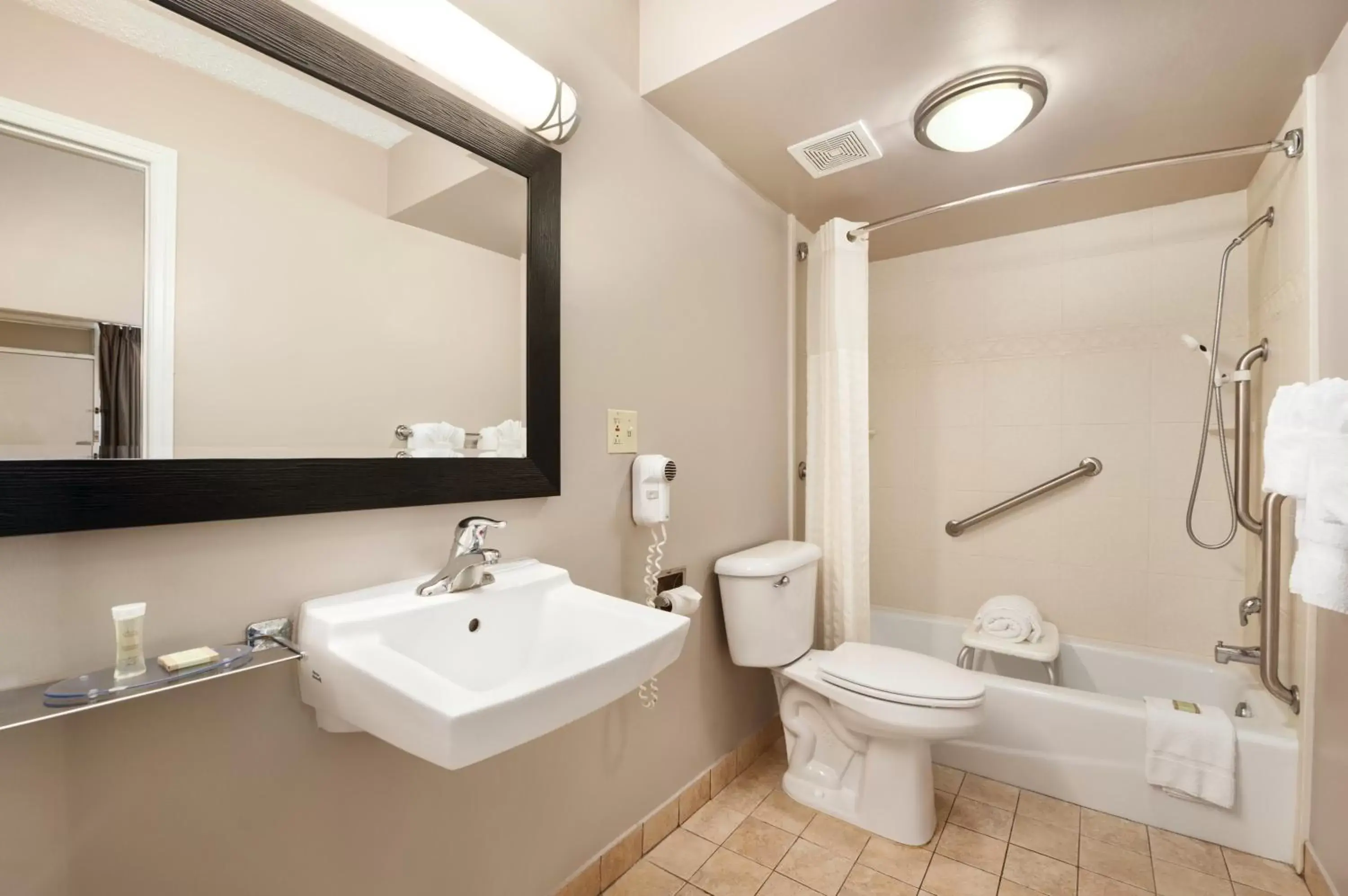 Bathroom in Super 8 by Wyndham Ormond Beach