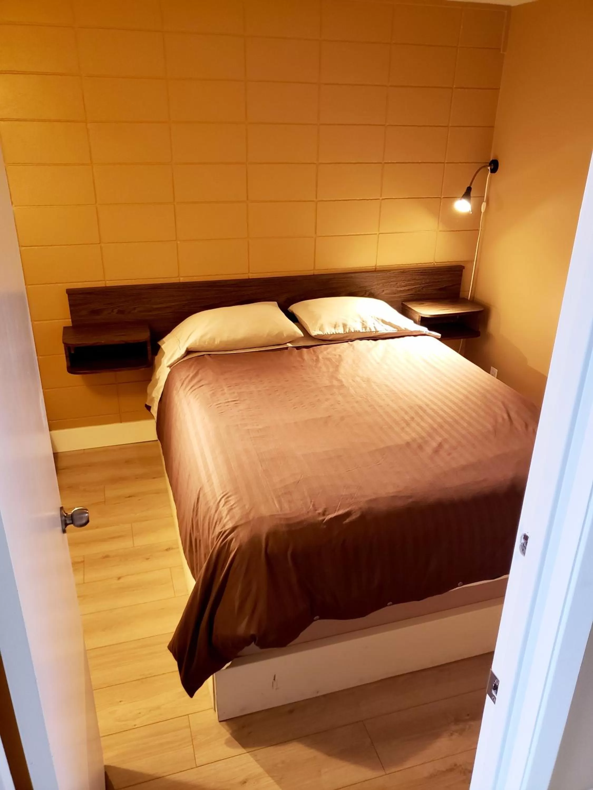 Bed in Above Tide Motel