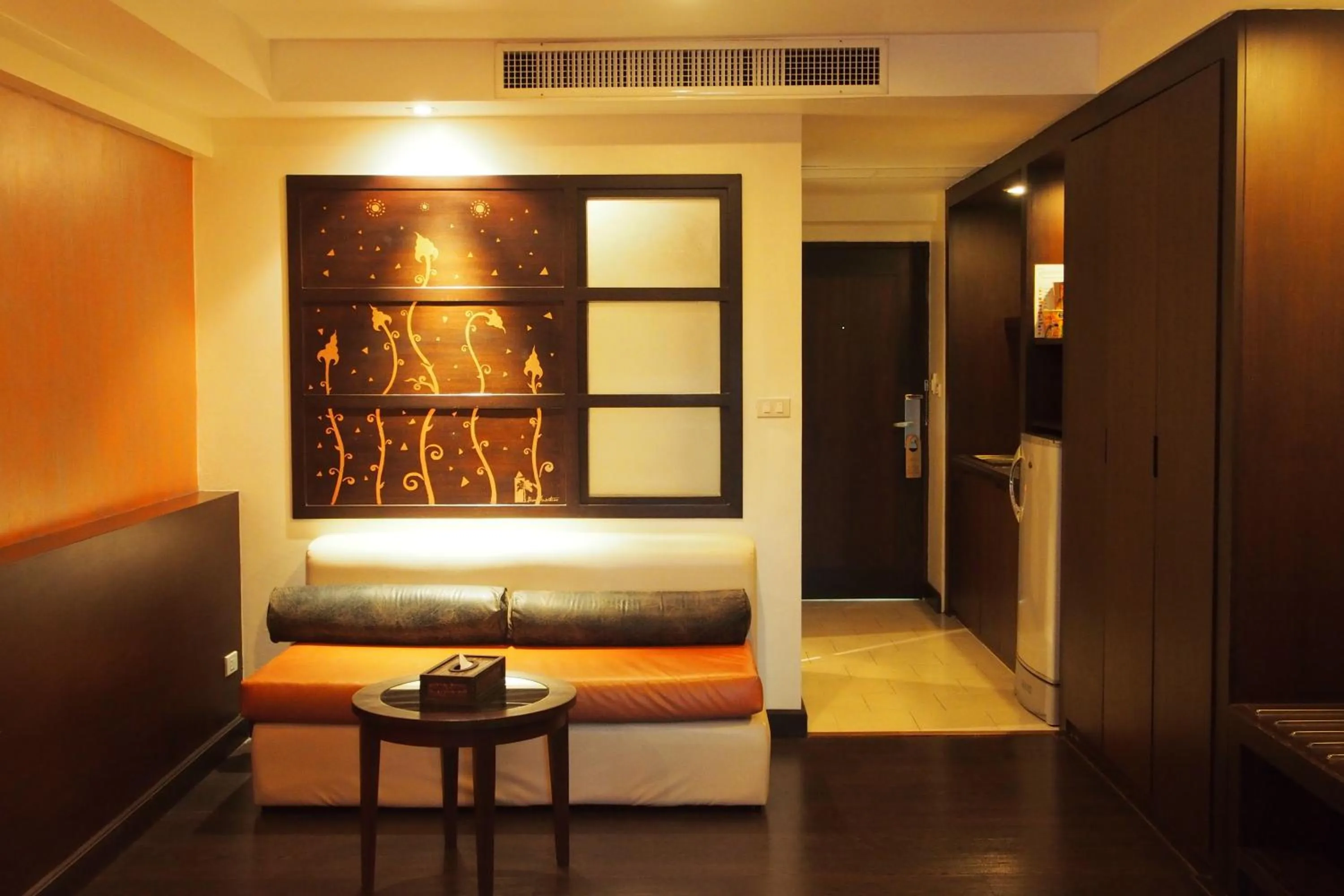 Seating area, Bed in Baan Suwantawe