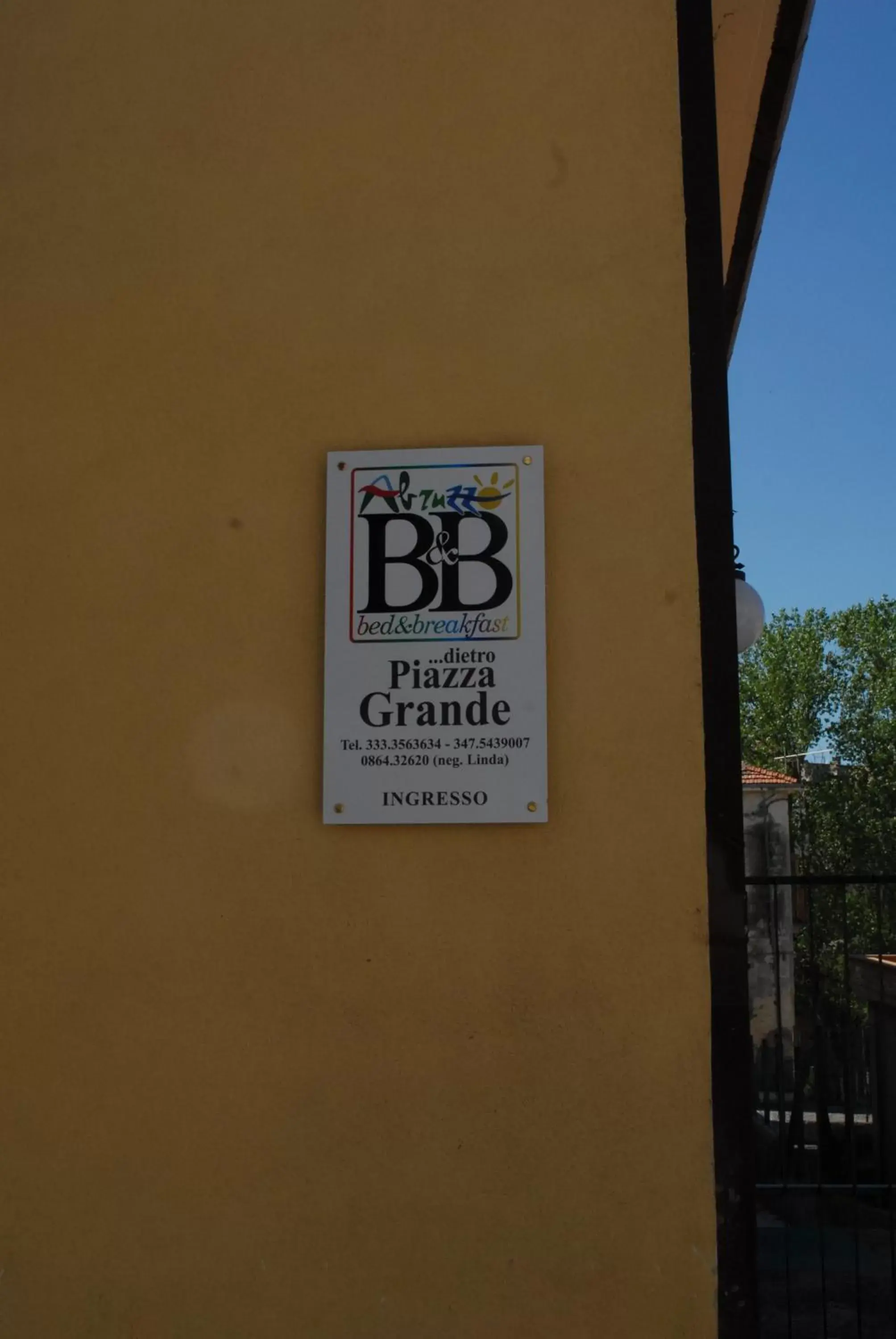 Property Logo/Sign in Dietro Piazza Maggiore