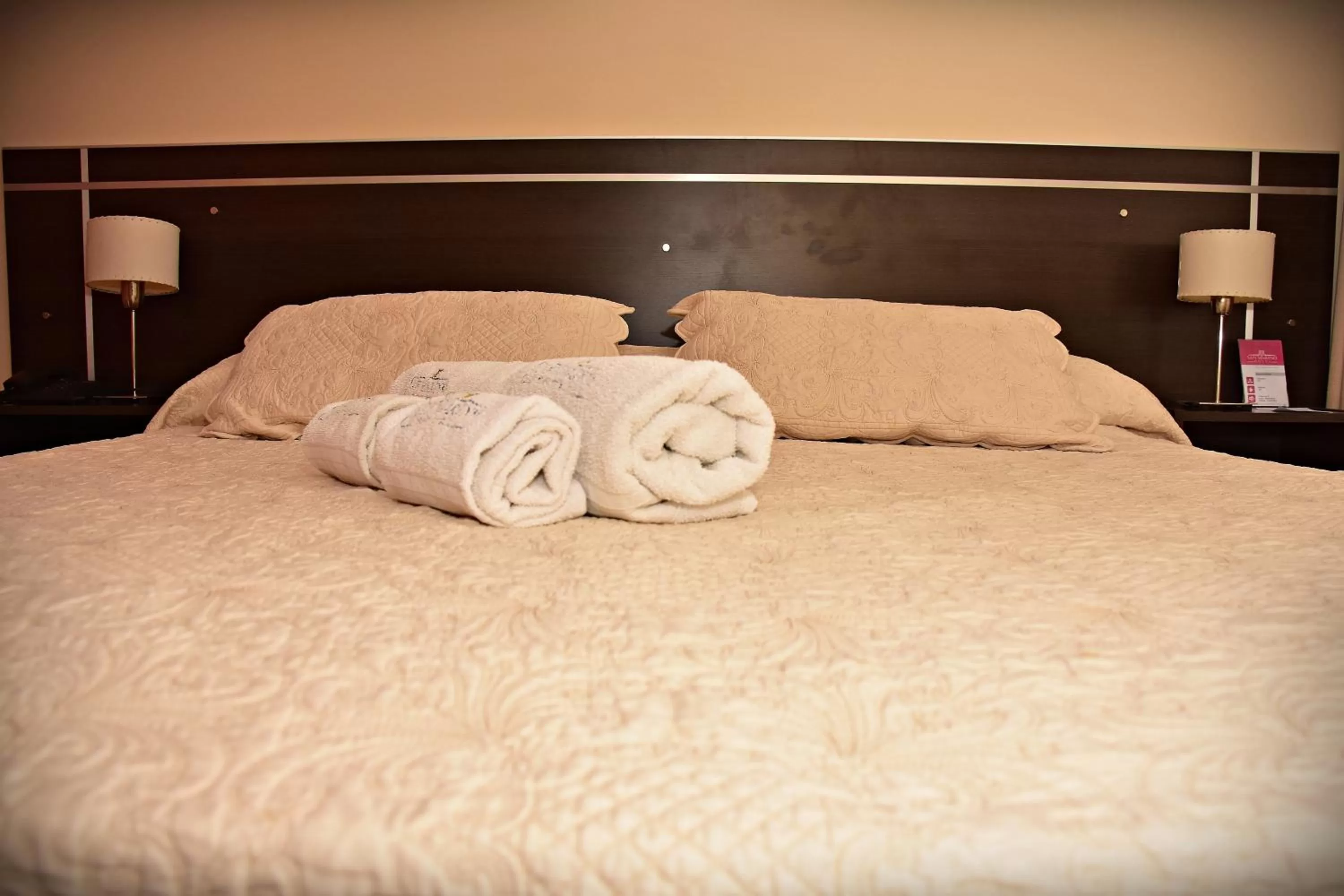 Bed in Hotel San Marino