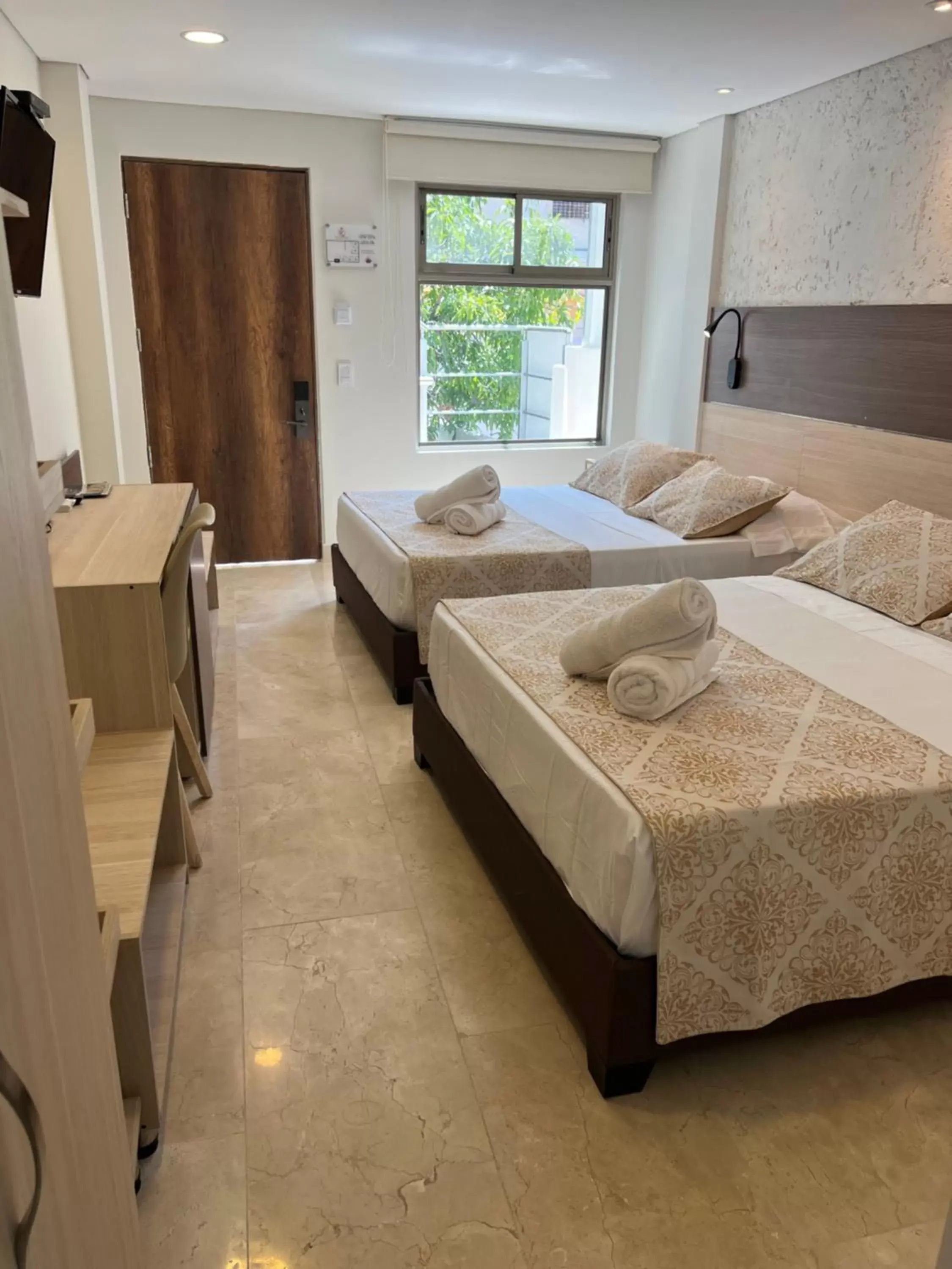 Bedroom in Hotel Cartagena Royal Inn
