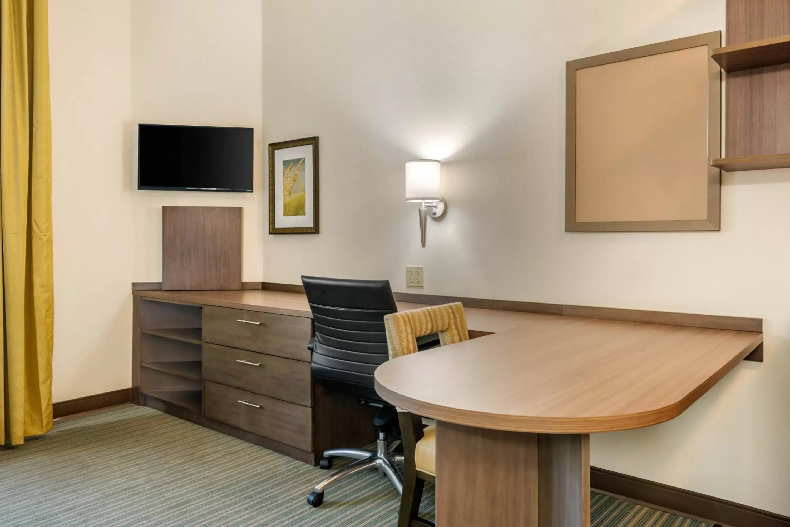 Photo of the whole room, TV/Entertainment Center in Candlewood Suites Fort Myers/Sanibel Gateway, an IHG Hotel