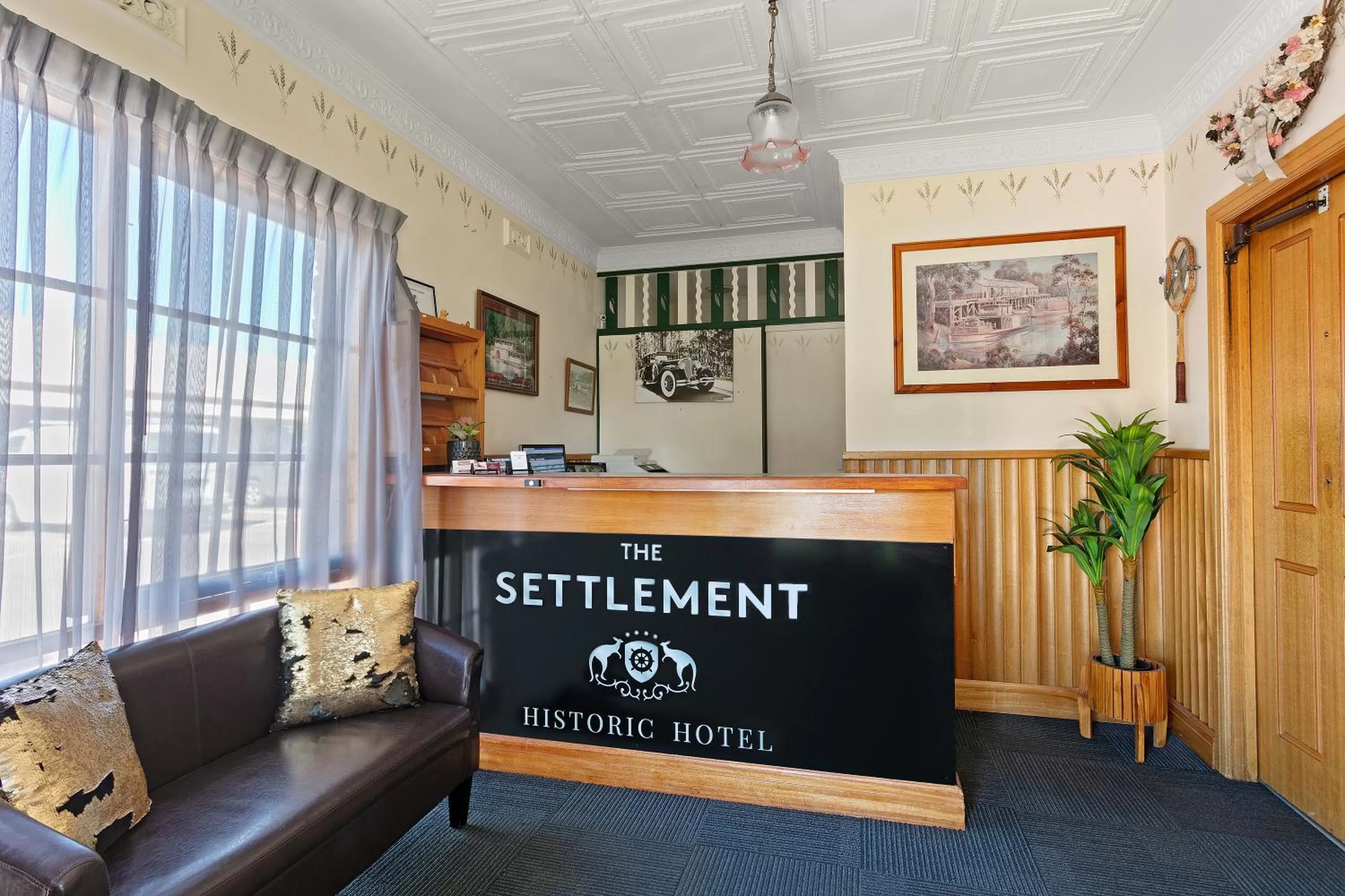 Property logo or sign in The Settlement Historic Hotel