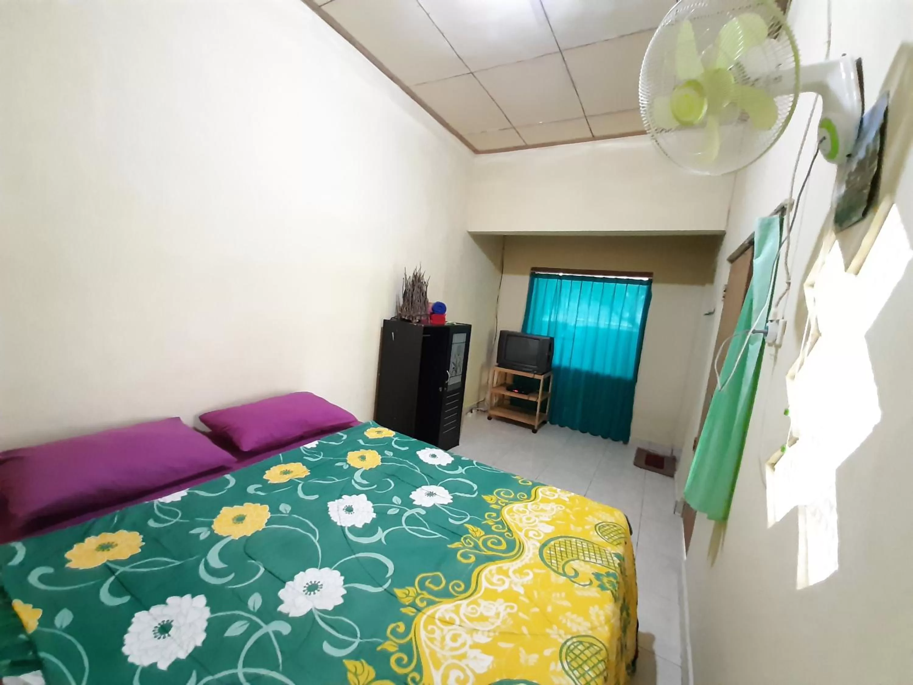 Bed in Penginapan Sedap Malam