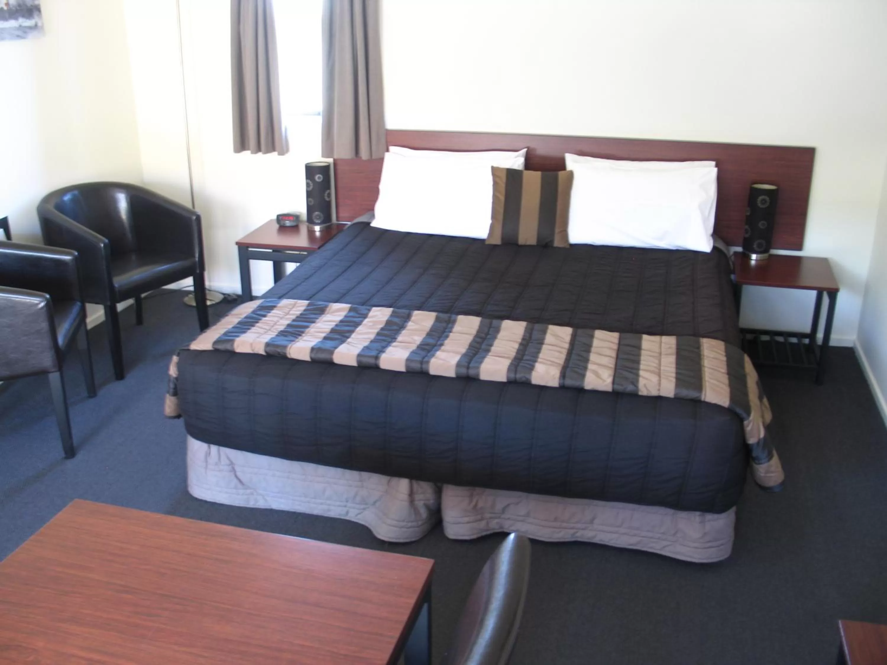 Bed in Sherborne Motor Lodge